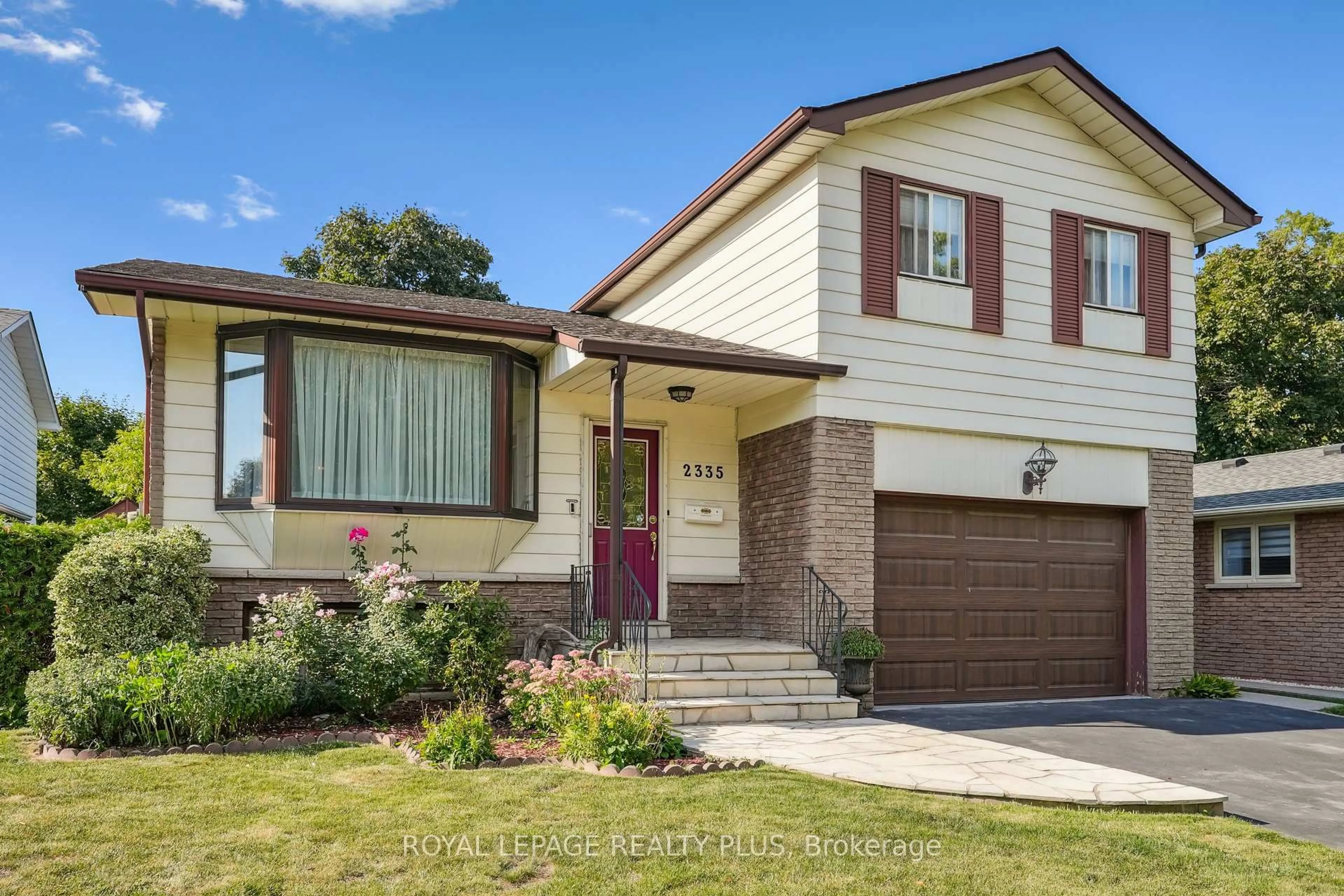 Home with brick exterior material, street for 2335 Wyandotte Dr, Oakville Ontario L6L 2T4