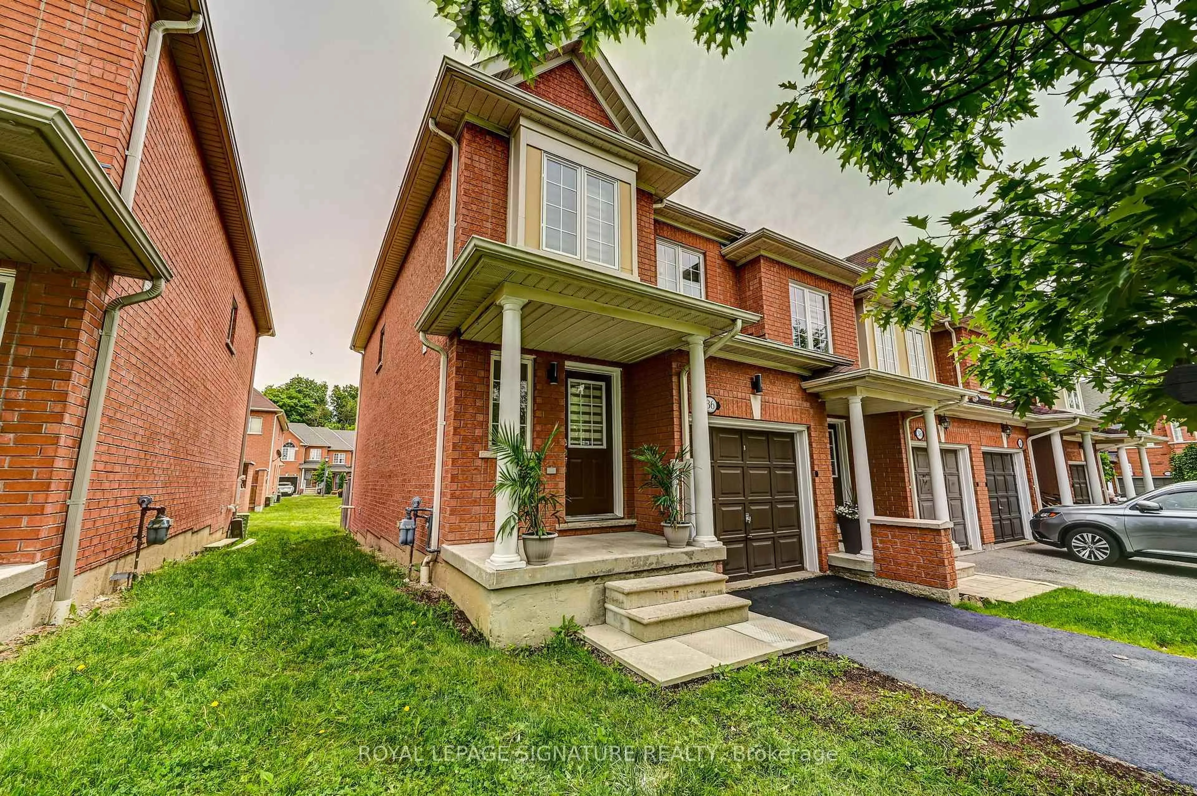 Home with brick exterior material, street for 7360 Zinnia Pl #36, Mississauga Ontario L5W 2A3