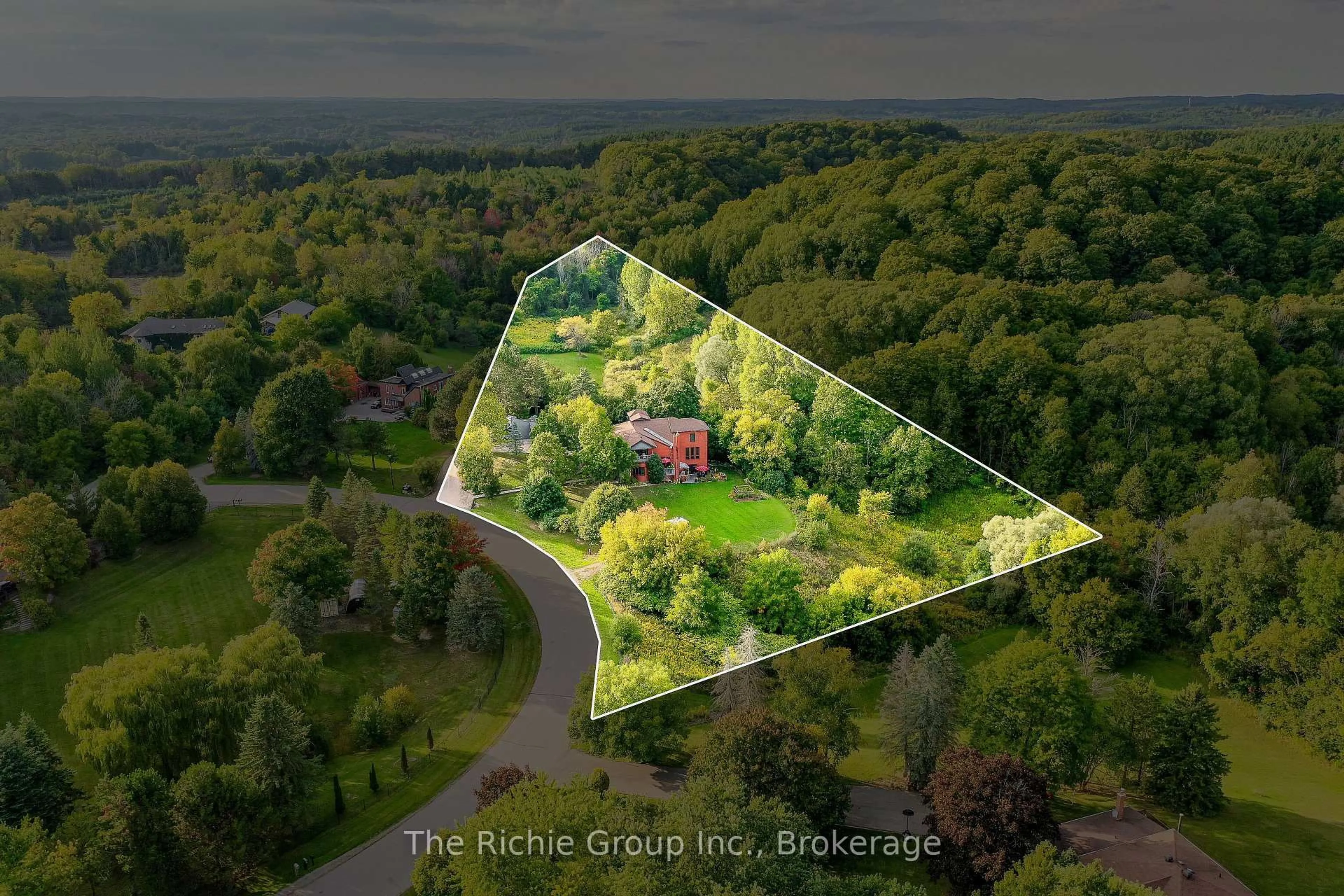 A pic from outside/outdoor area/front of a property/back of a property/a pic from drone, unknown for 21 Bartley Dr, Caledon Ontario L7E 0N1