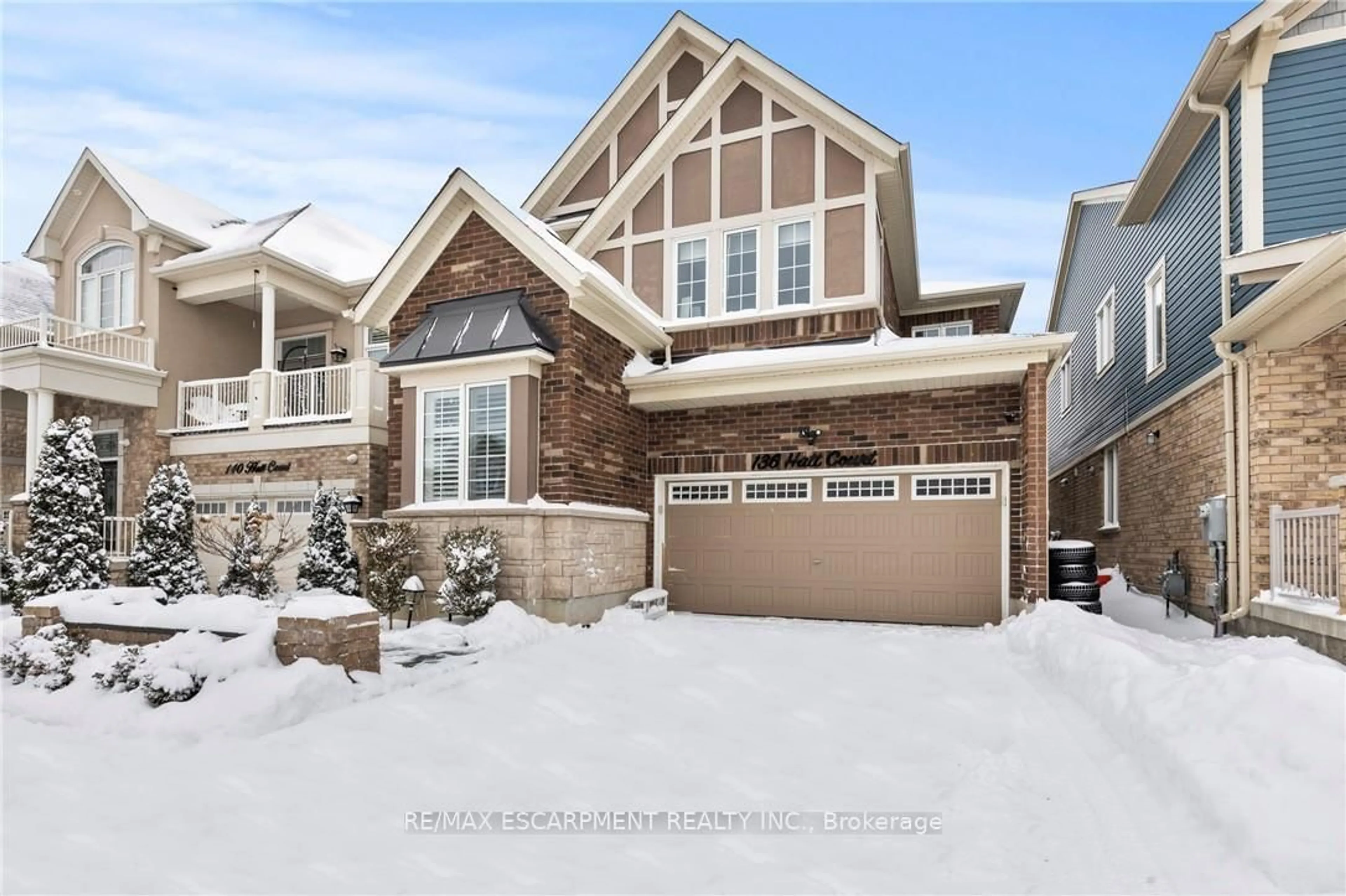 Home with brick exterior material, street for 136 HATT Crt, Milton Ontario L9E 1G7