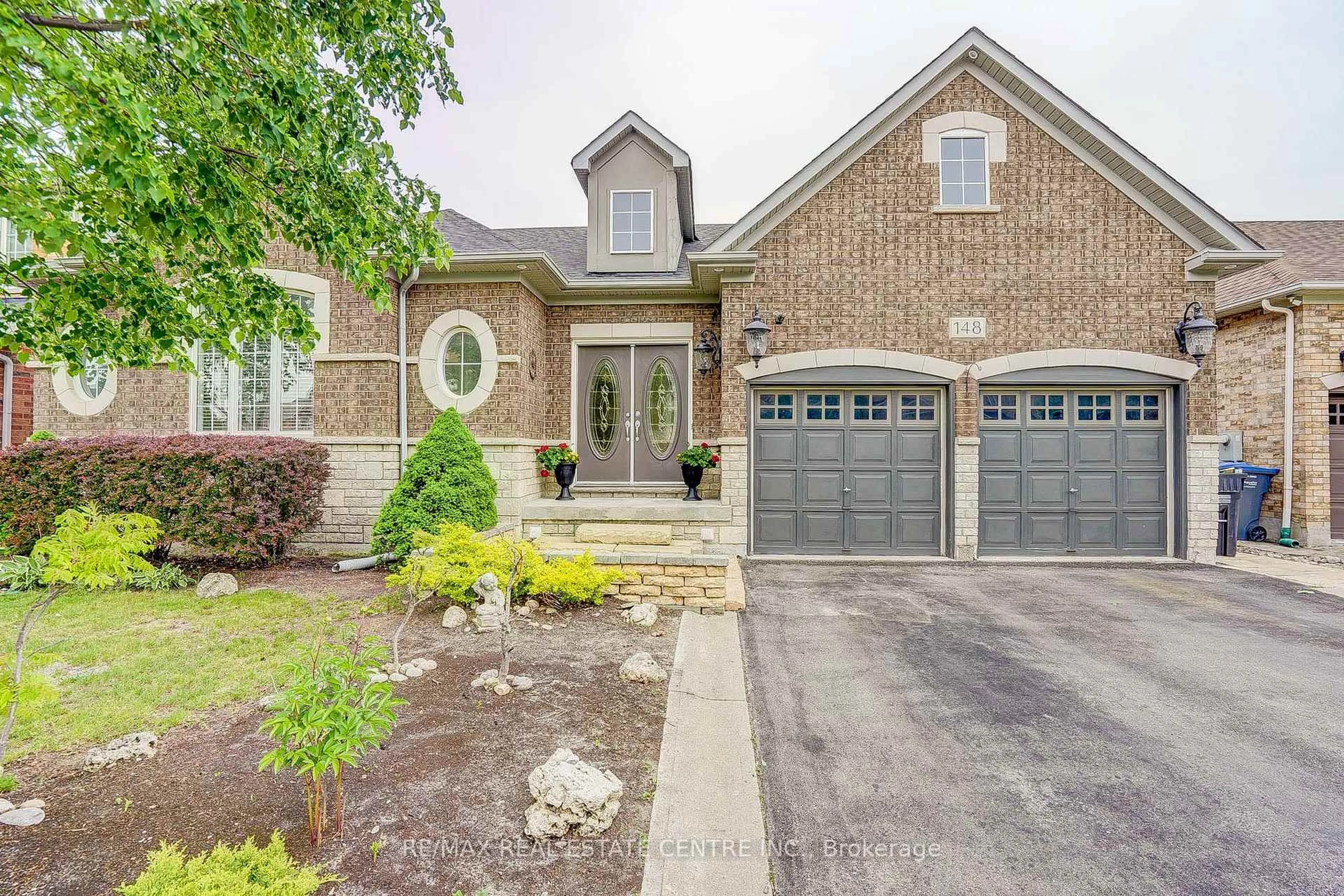 Home with brick exterior material, street for 148 Bonistel Cres, Brampton Ontario L7A 3H1