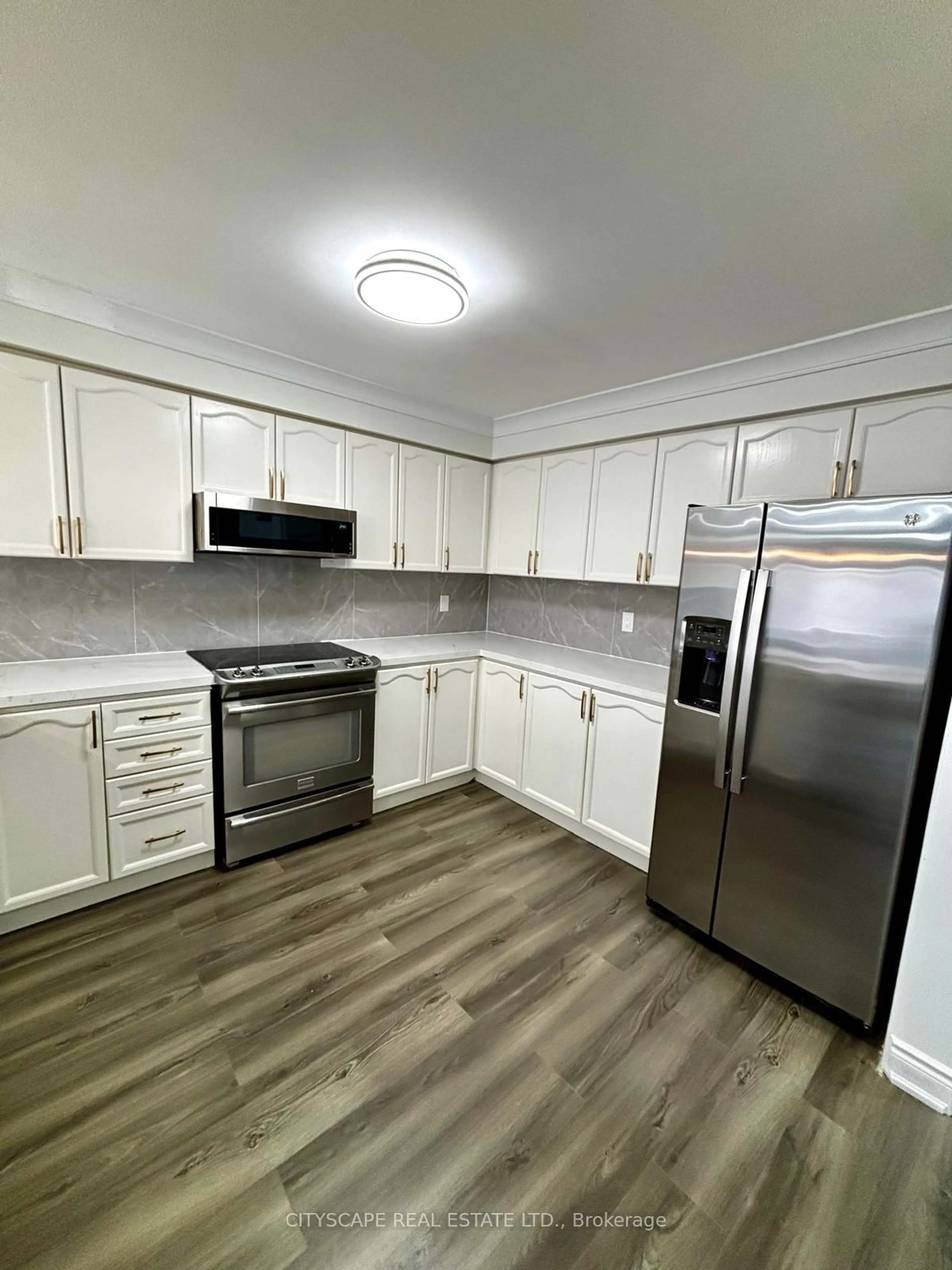 Standard kitchen, wood/laminate floor for 3974 Stardust Dr, Mississauga Ontario L5M 8A5