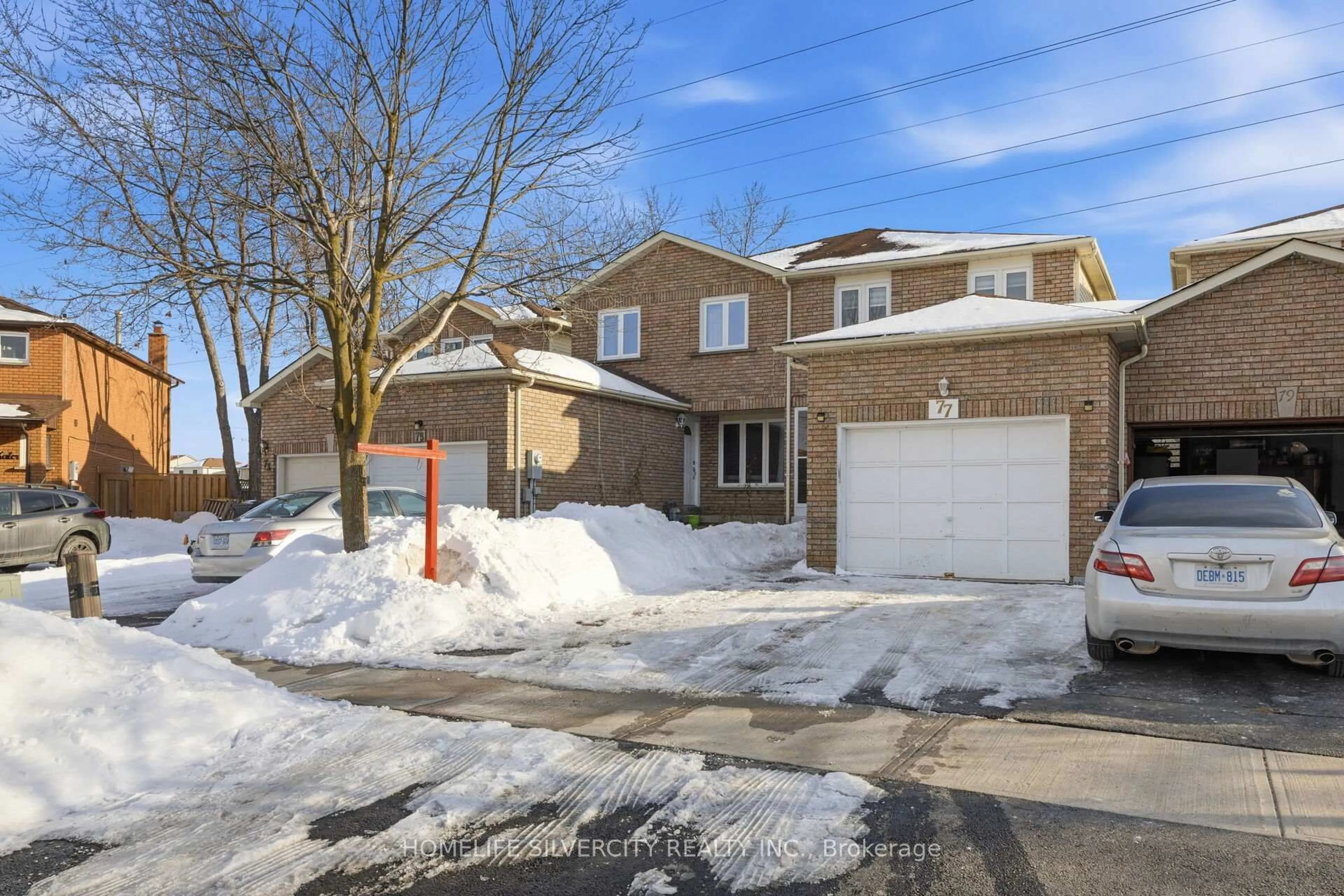 Home with brick exterior material, street for 77 Tulip Dr, Brampton Ontario L6Y 3W9