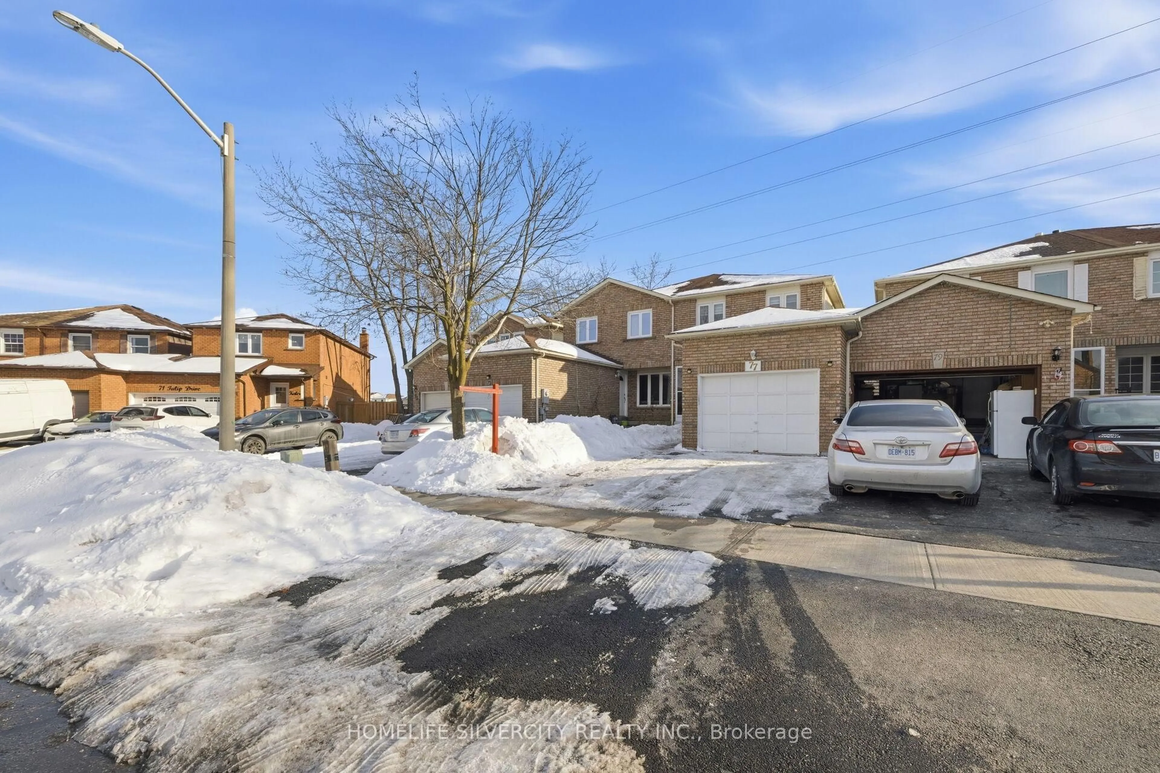 A pic from outside/outdoor area/front of a property/back of a property/a pic from drone, street for 77 Tulip Dr, Brampton Ontario L6Y 3W9