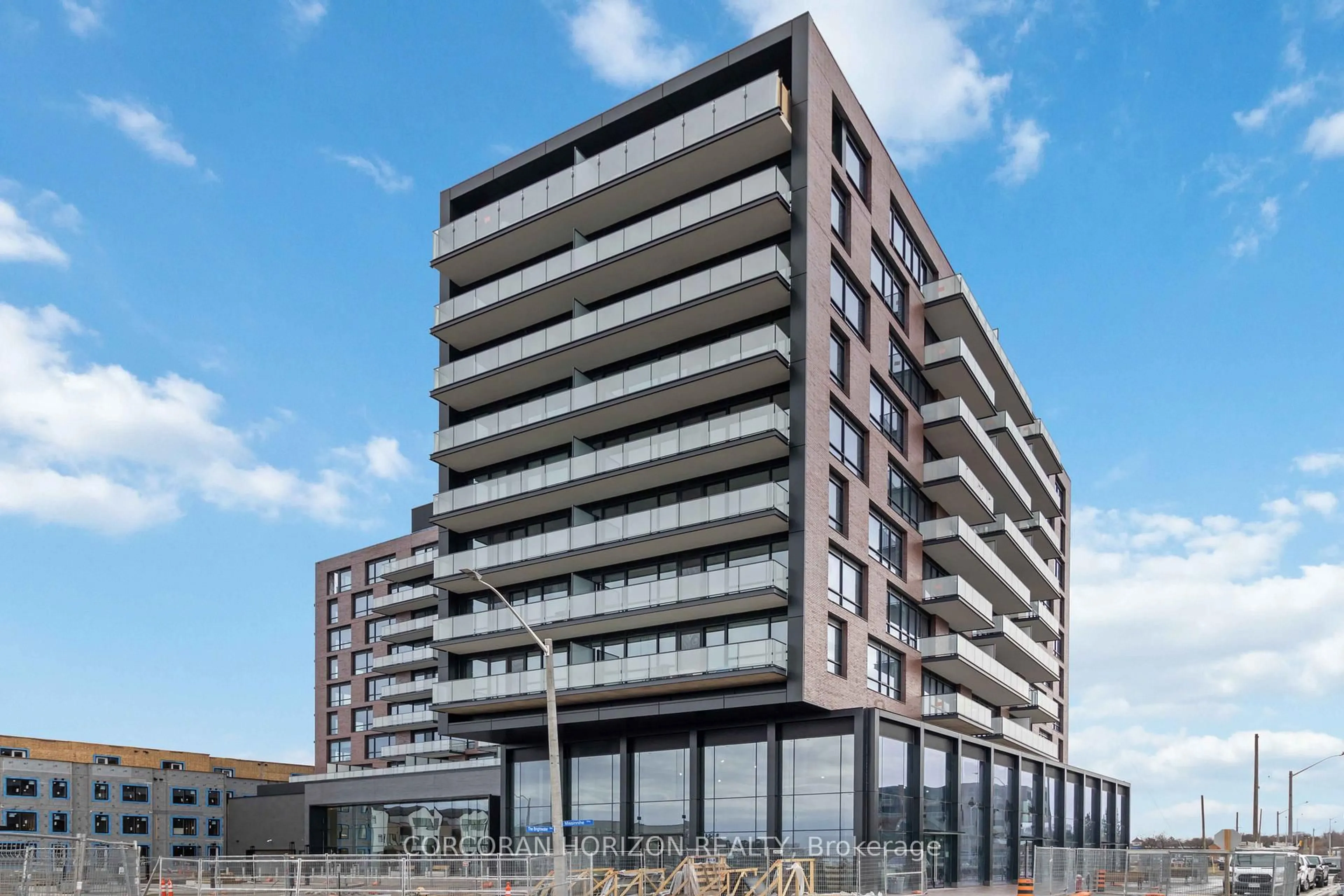 A pic from outside/outdoor area/front of a property/back of a property/a pic from drone, building for 251 Masonry Way #807, Mississauga Ontario L5H 0B2