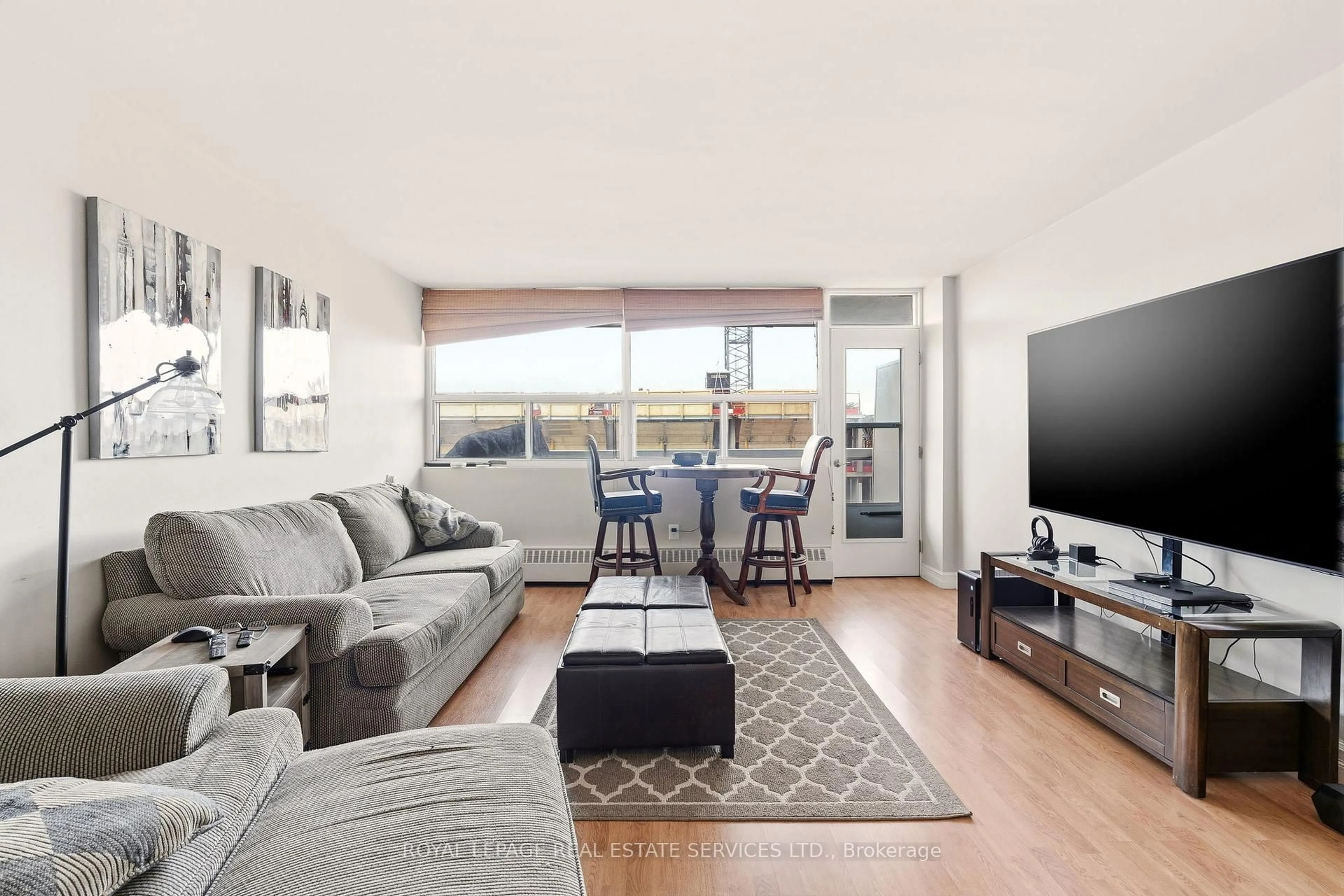 Living room with furniture, unknown for 2263 Marine Dr #602, Oakville Ontario L6L 5K1