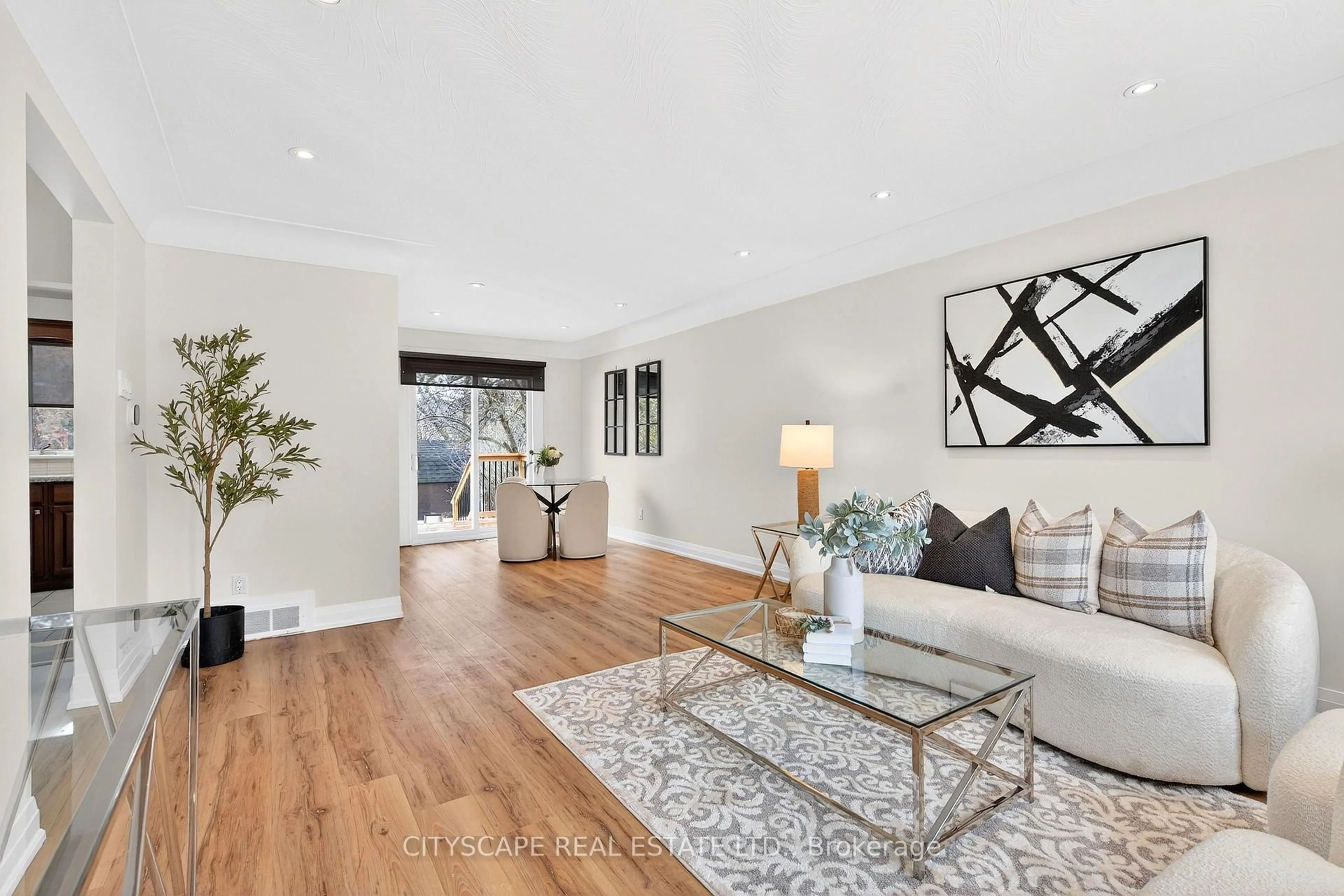 Living room with furniture, wood/laminate floor for 218 Fairfax Pl, Burlington Ontario L7L 4S8