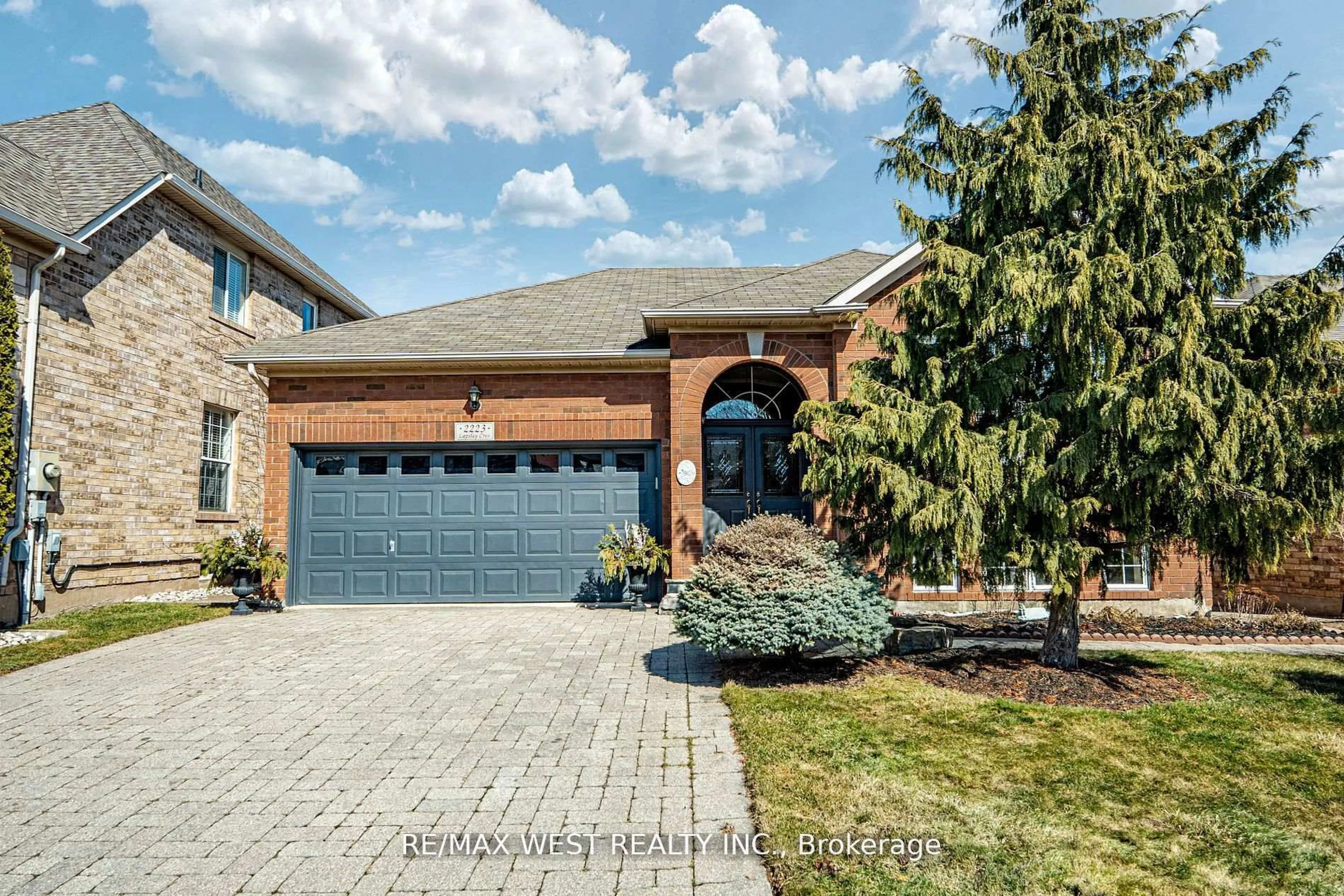 Home with brick exterior material, street for 2223 Lapsley Cres, Oakville Ontario L6M 4V1