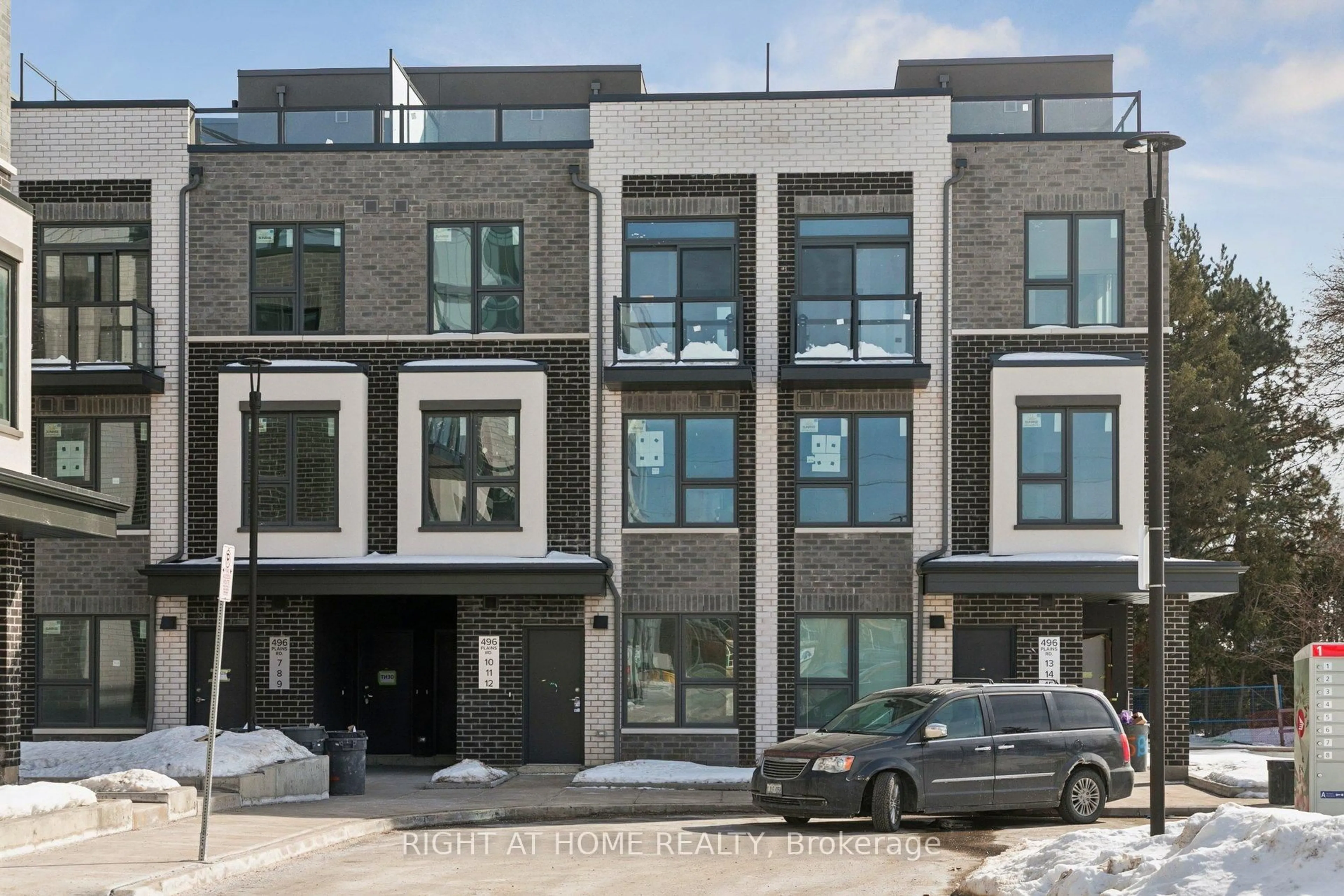 Home with brick exterior material, street for 496 Plains Rd #TH30 (unit# 9), Burlington Ontario L7T 2E1