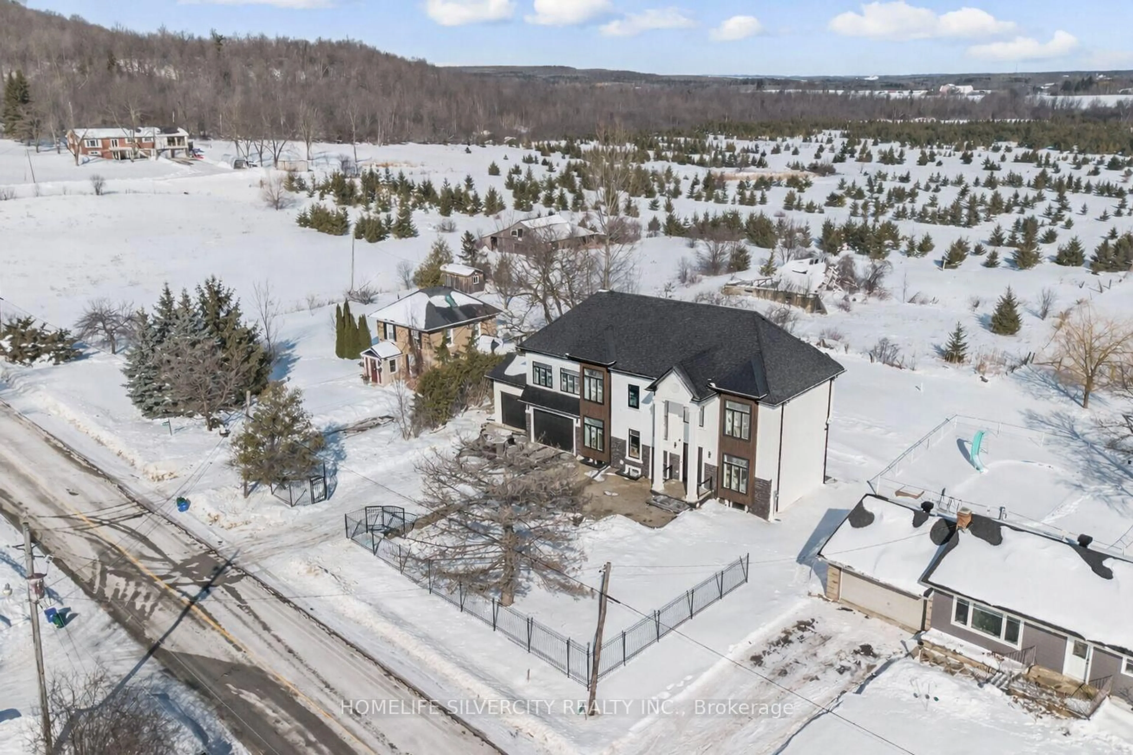 A pic from outside/outdoor area/front of a property/back of a property/a pic from drone, street for 12931 Ninth Line, Halton Hills Ontario L7G 4S8