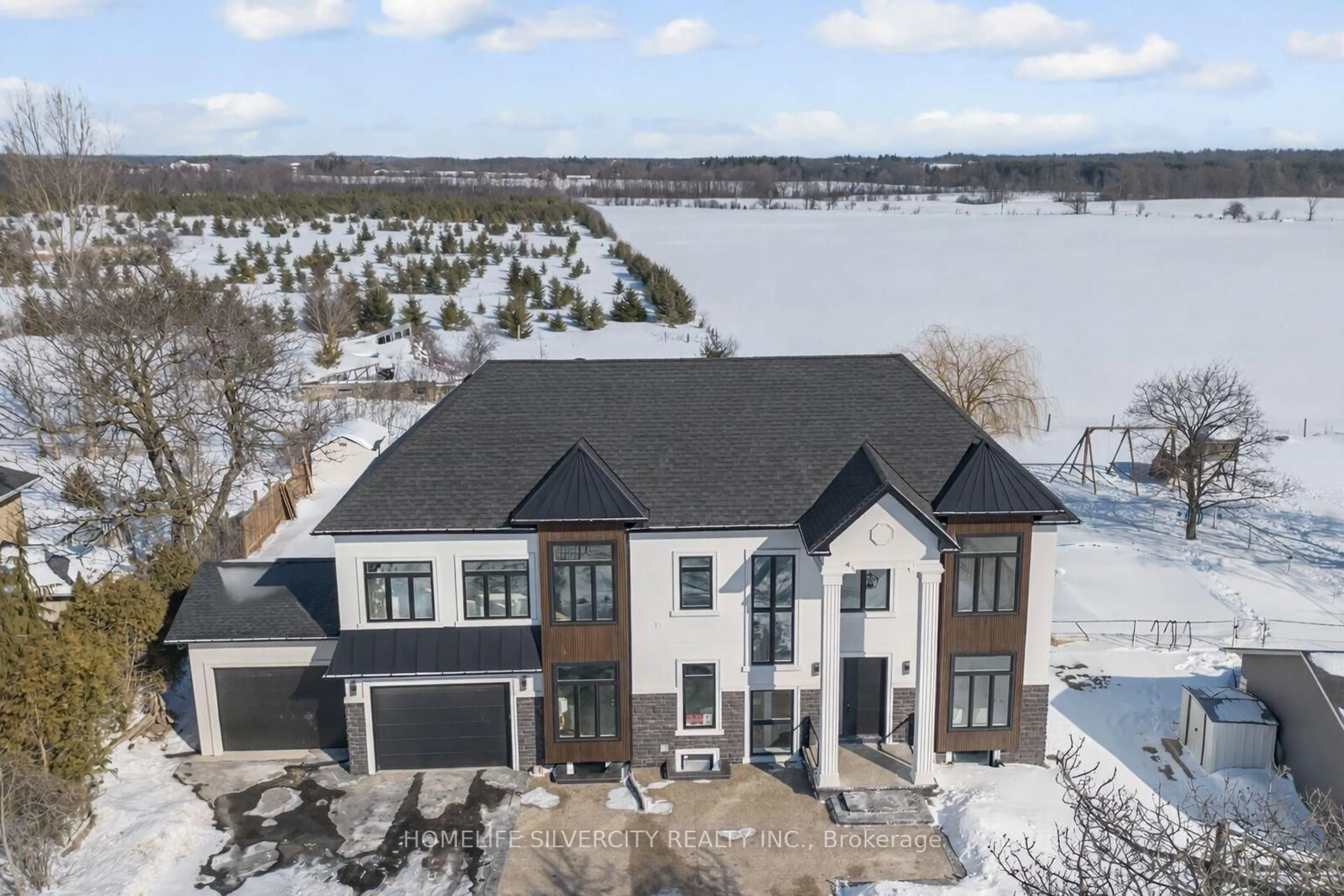A pic from outside/outdoor area/front of a property/back of a property/a pic from drone, water/lake/river/ocean view for 12931 Ninth Line, Halton Hills Ontario L7G 4S8