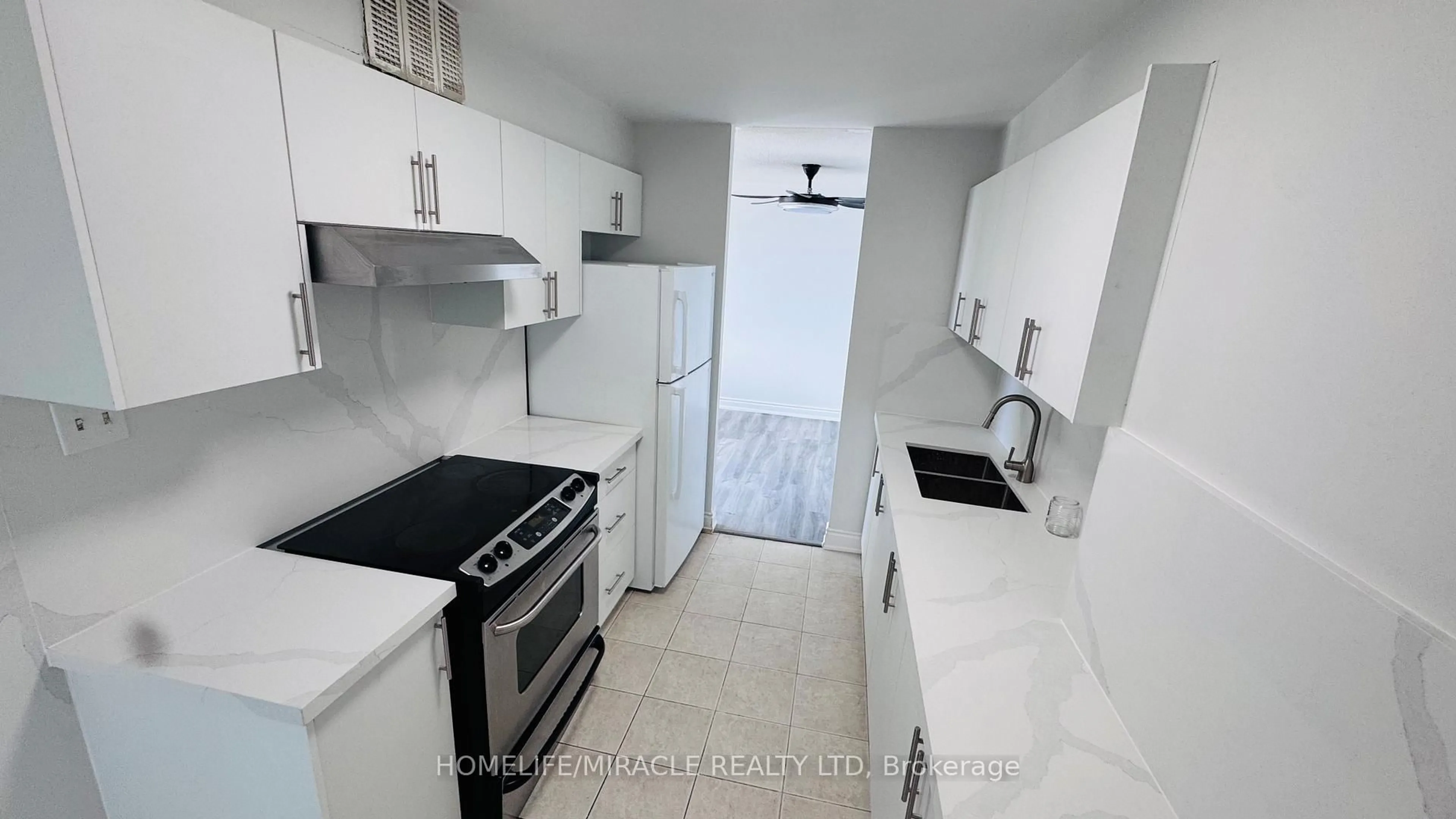 Standard kitchen, ceramic/tile floor for 2645 Kipling Ave #307, Toronto Ontario M9V 3S6