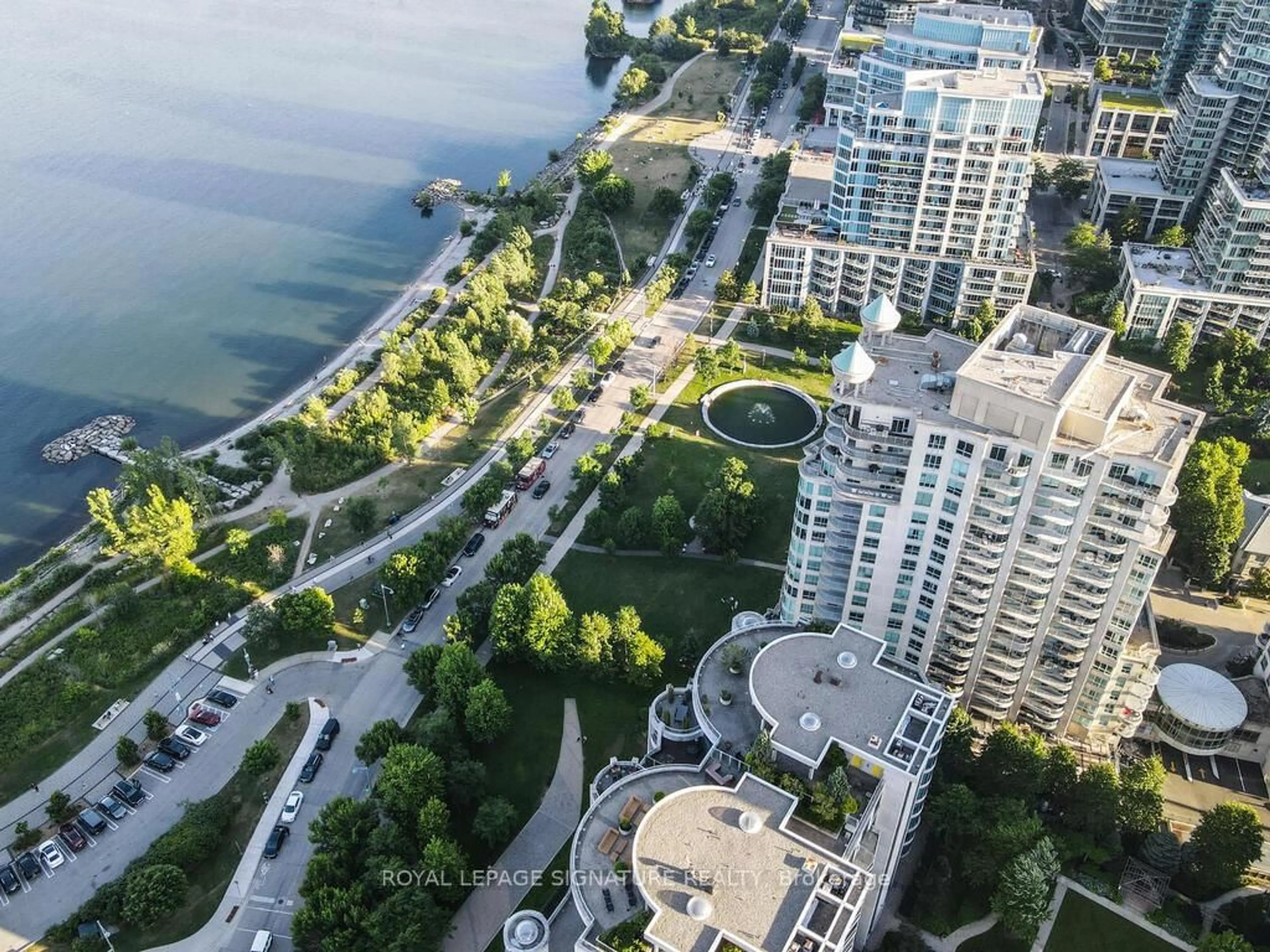A pic from outside/outdoor area/front of a property/back of a property/a pic from drone, water/lake/river/ocean view for 2111 Lake Shore Blvd #719, Toronto Ontario M8V 4B2