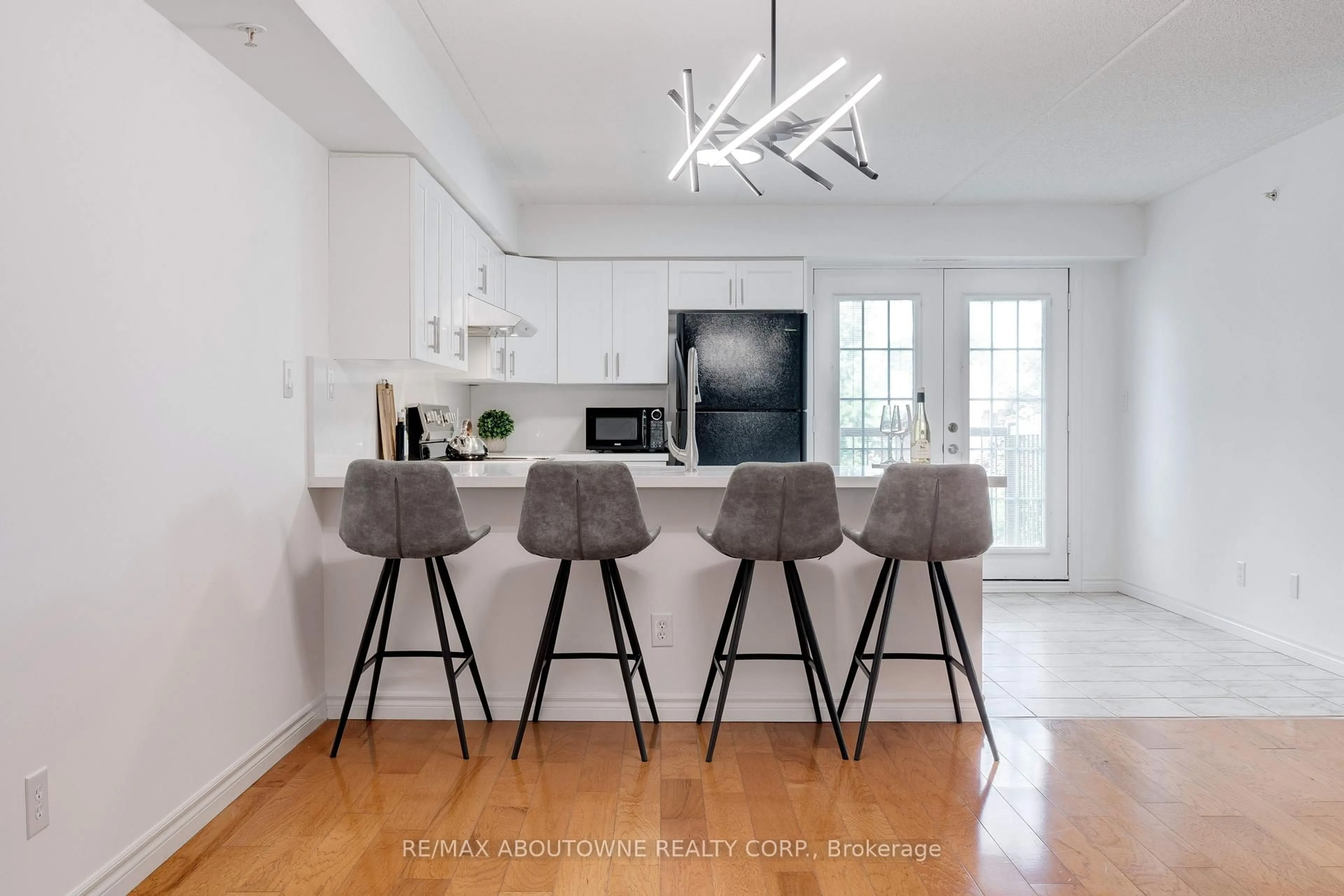 Open concept kitchen, unknown for 1460 Bishops Gate #212, Oakville Ontario L6M 4N5