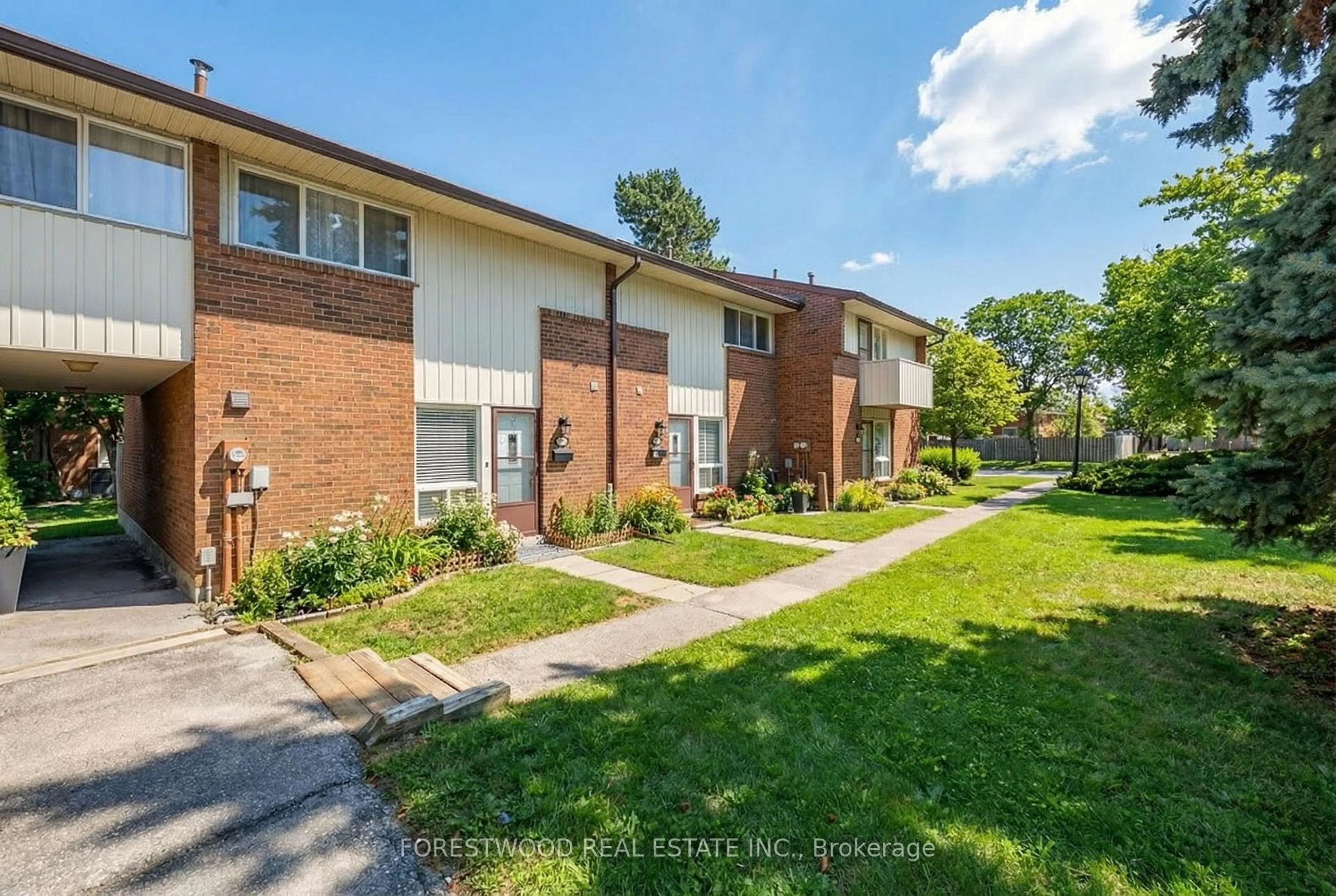 Home with brick exterior material, street for 3665 Flamewood Dr #50, Mississauga Ontario L4Y 3P5