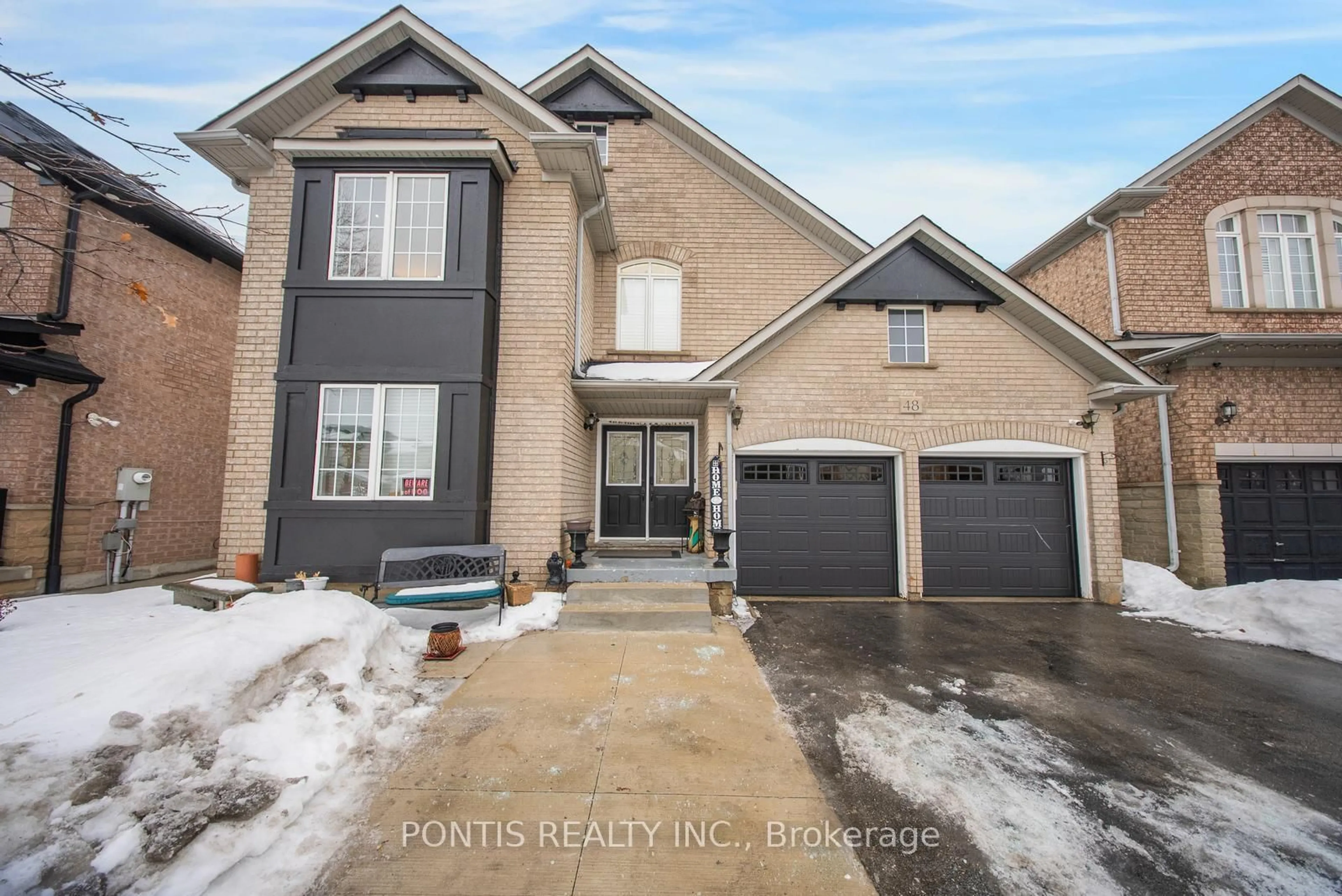 Home with brick exterior material, street for 48 Sawston Circ, Brampton Ontario L7A 2N7