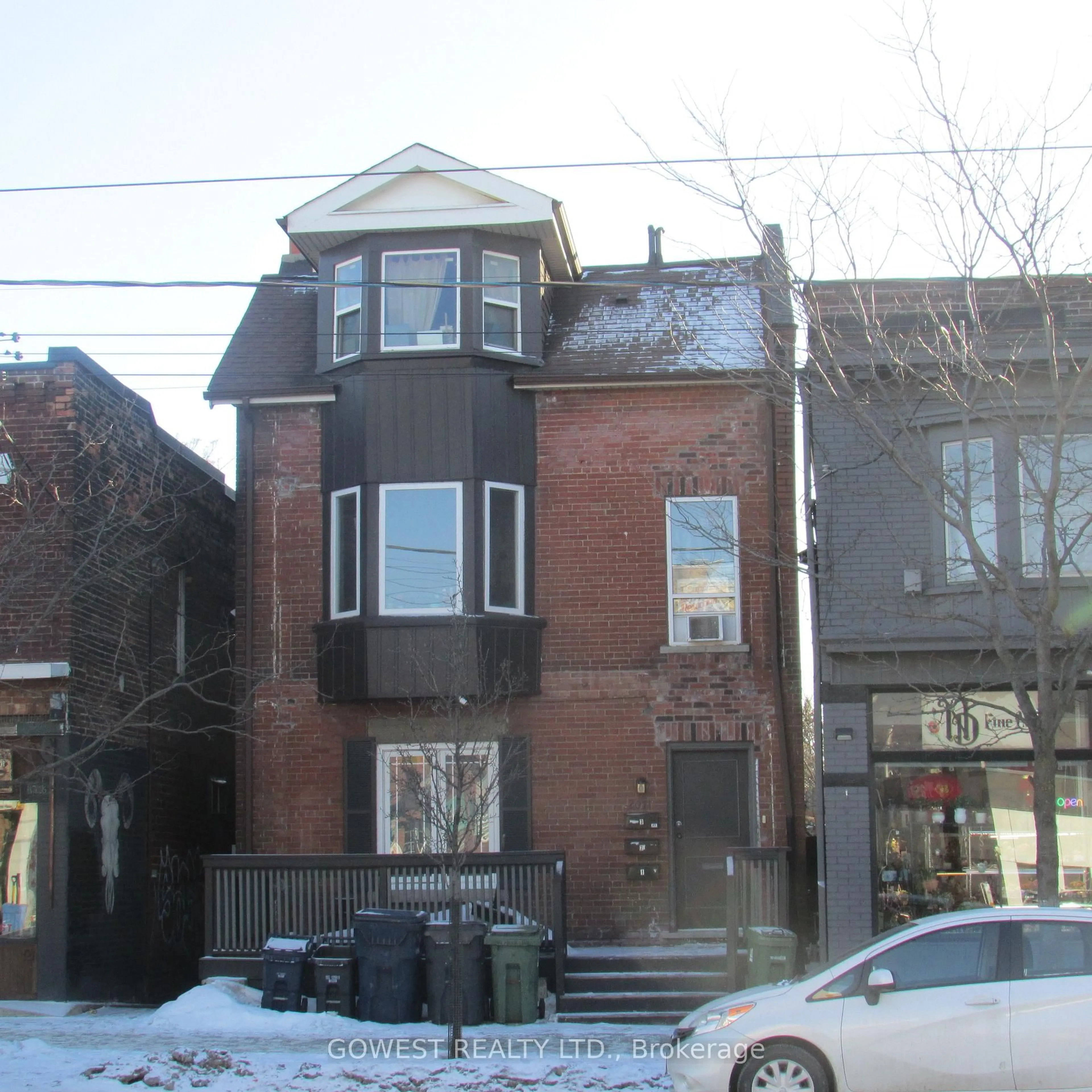 Home with brick exterior material, street for 2011 Dundas St, Toronto Ontario M6R 1W7