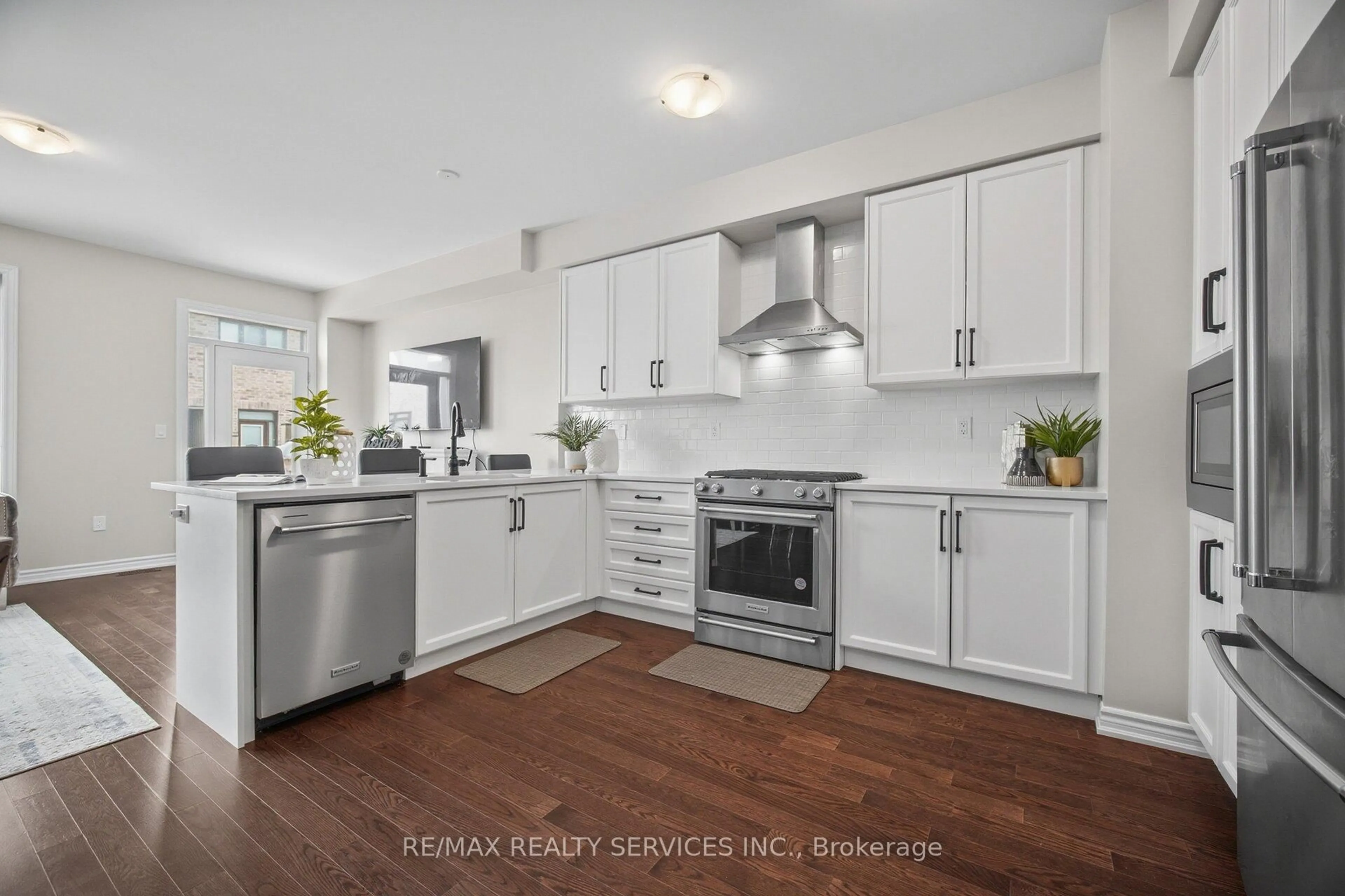Open concept kitchen, unknown for 1417 Watercress Way, Milton Ontario L9E 1T7
