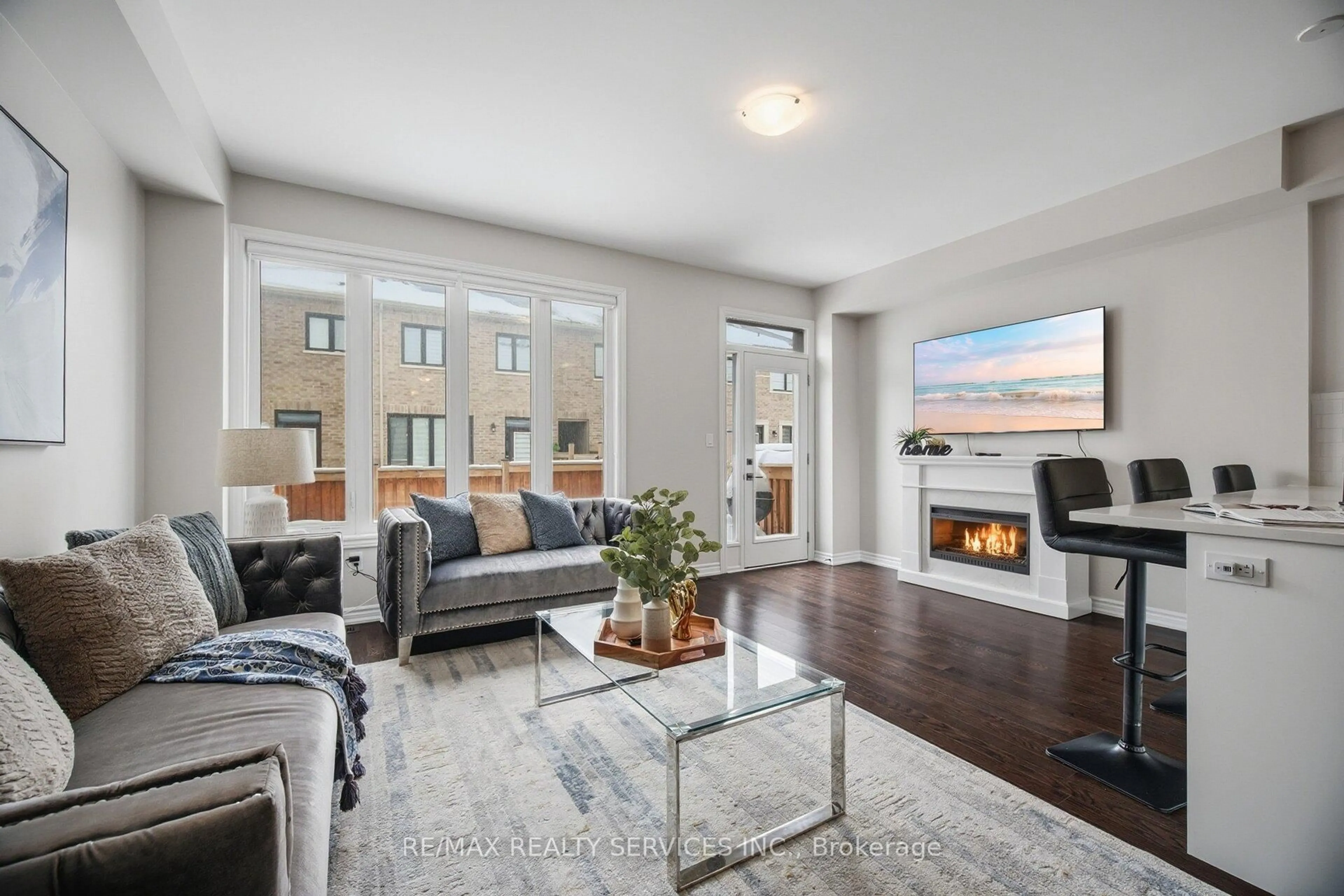 Living room with furniture, unknown for 1417 Watercress Way, Milton Ontario L9E 1T7