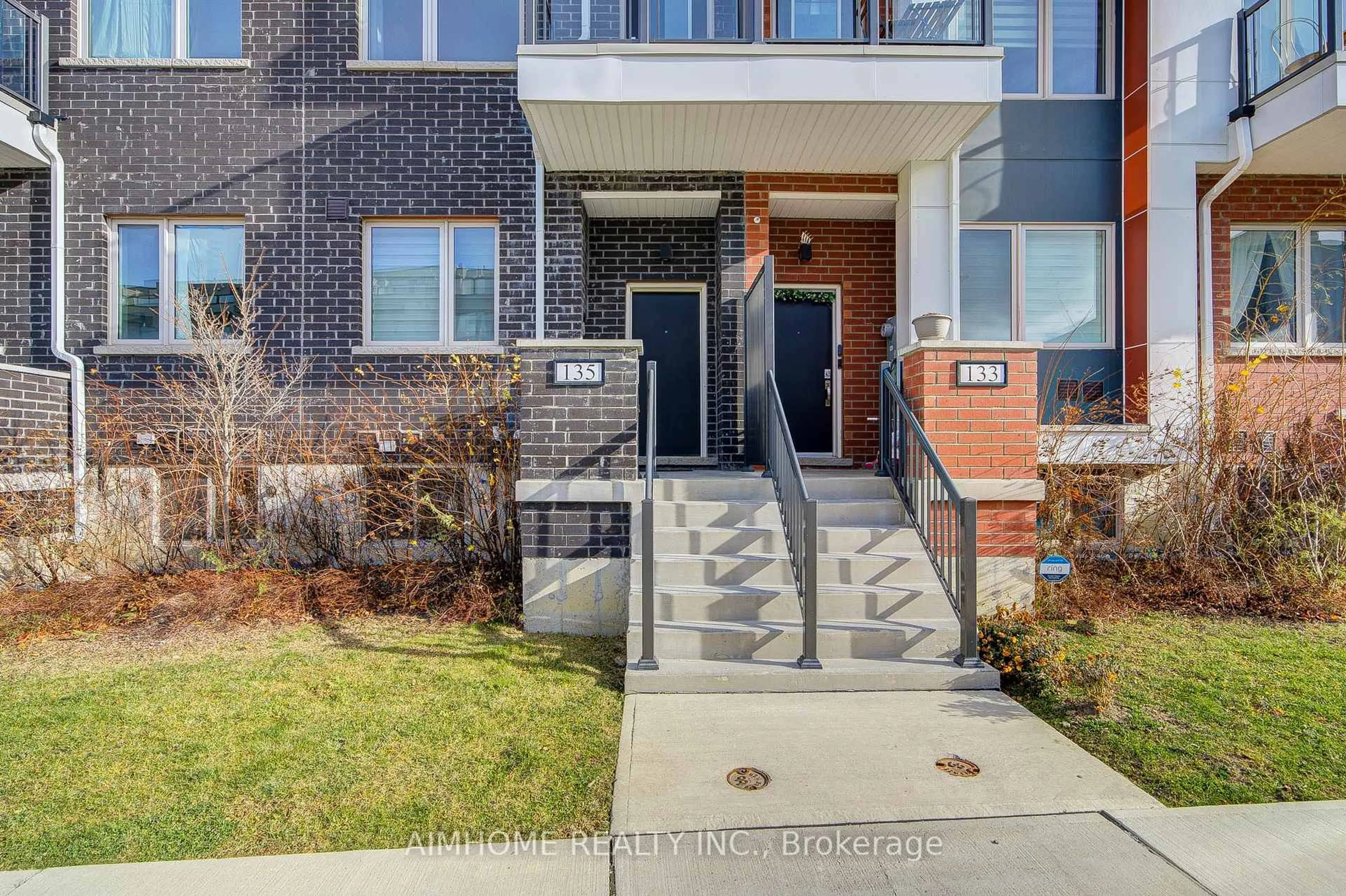 Home with brick exterior material, street for 135 Frederick Tisdale Dr, Toronto Ontario M3K 0C6