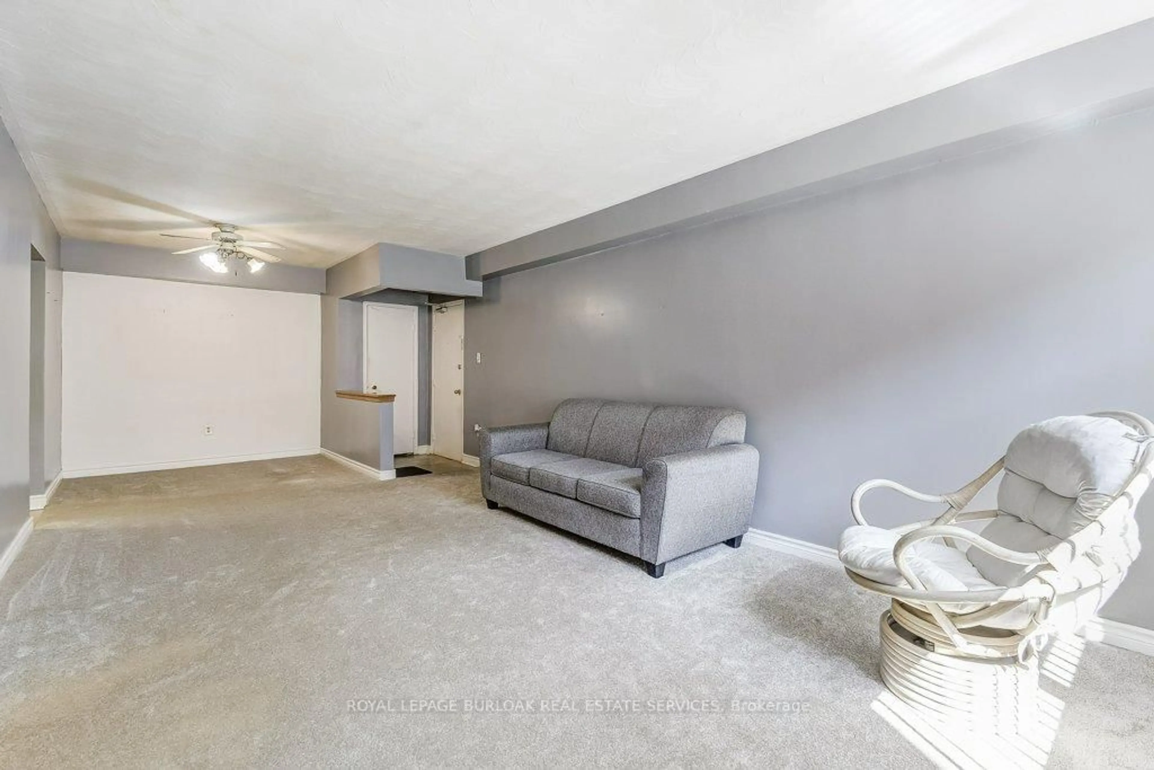 Living room with furniture, unknown for 2418 New St #1, Burlington Ontario L7R 1J6