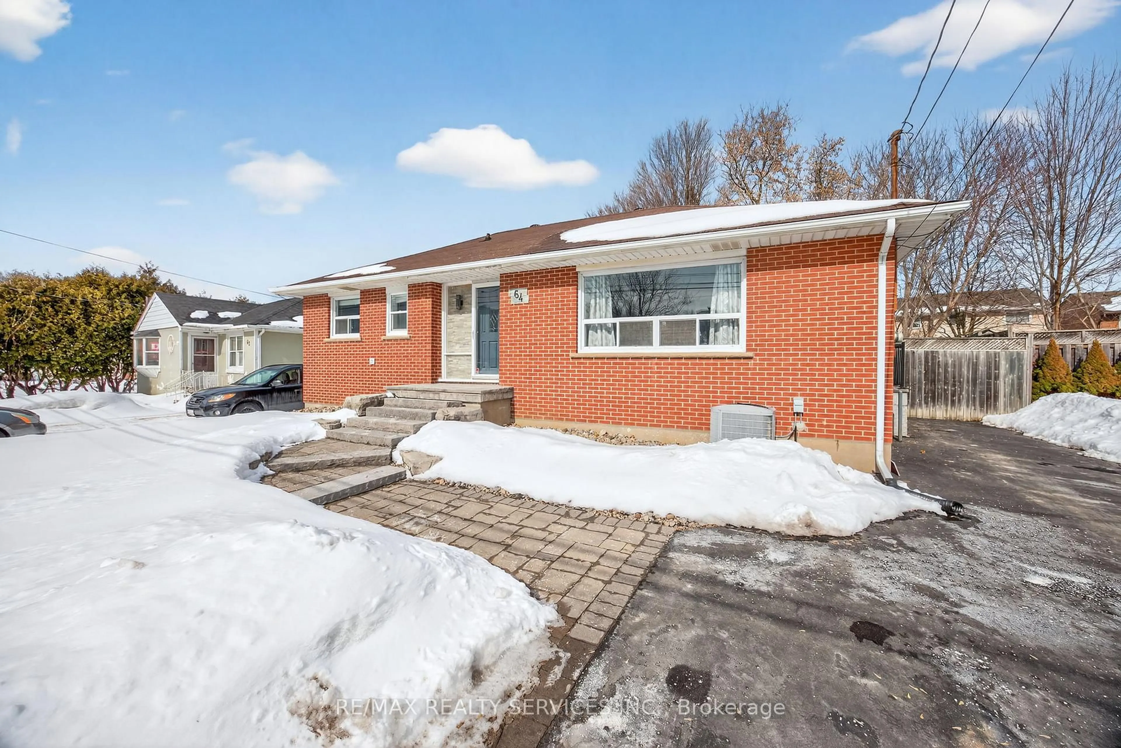 Home with brick exterior material, street for 64 River Dr, Halton Hills Ontario L7G 2J2
