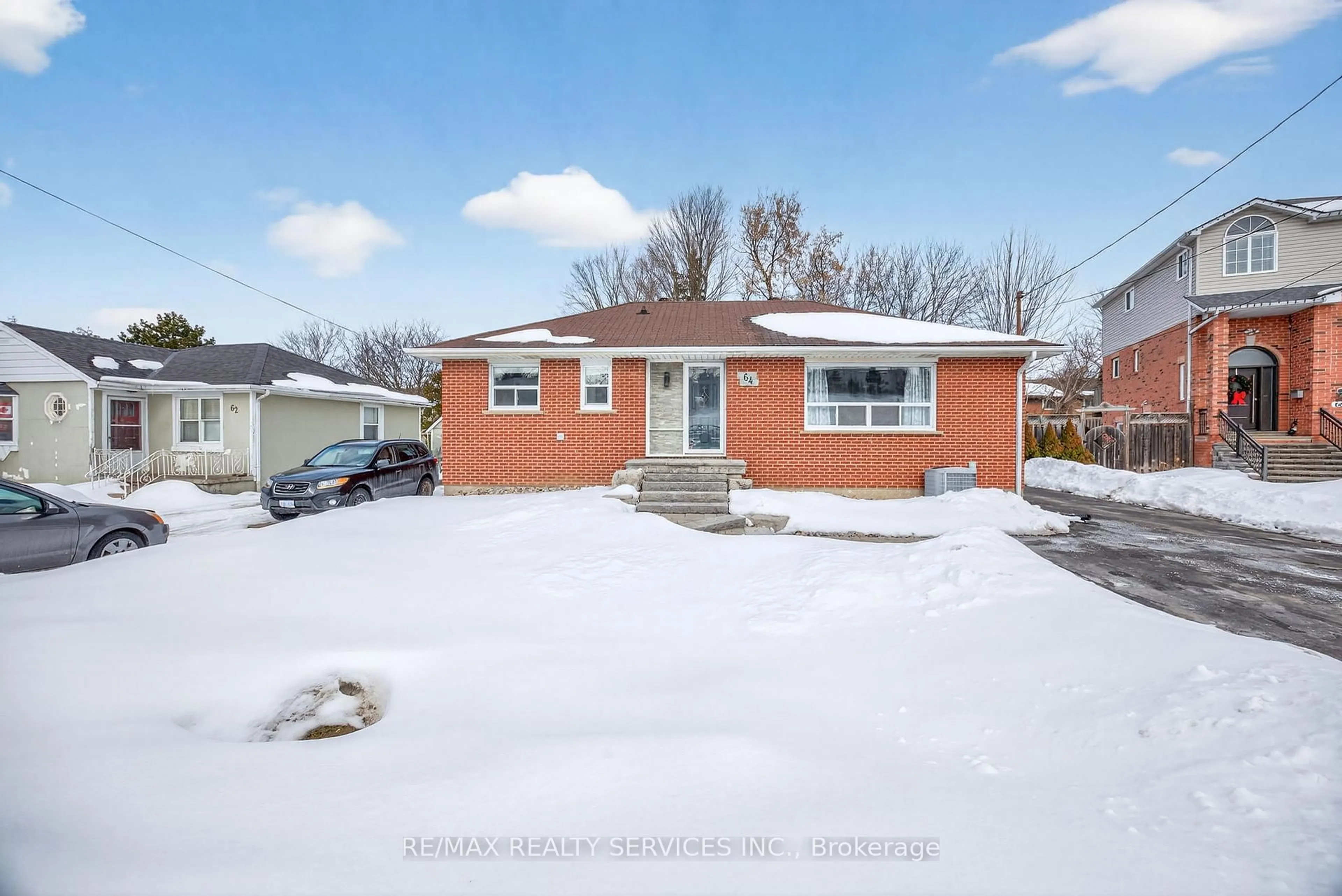 A pic from outside/outdoor area/front of a property/back of a property/a pic from drone, street for 64 River Dr, Halton Hills Ontario L7G 2J2