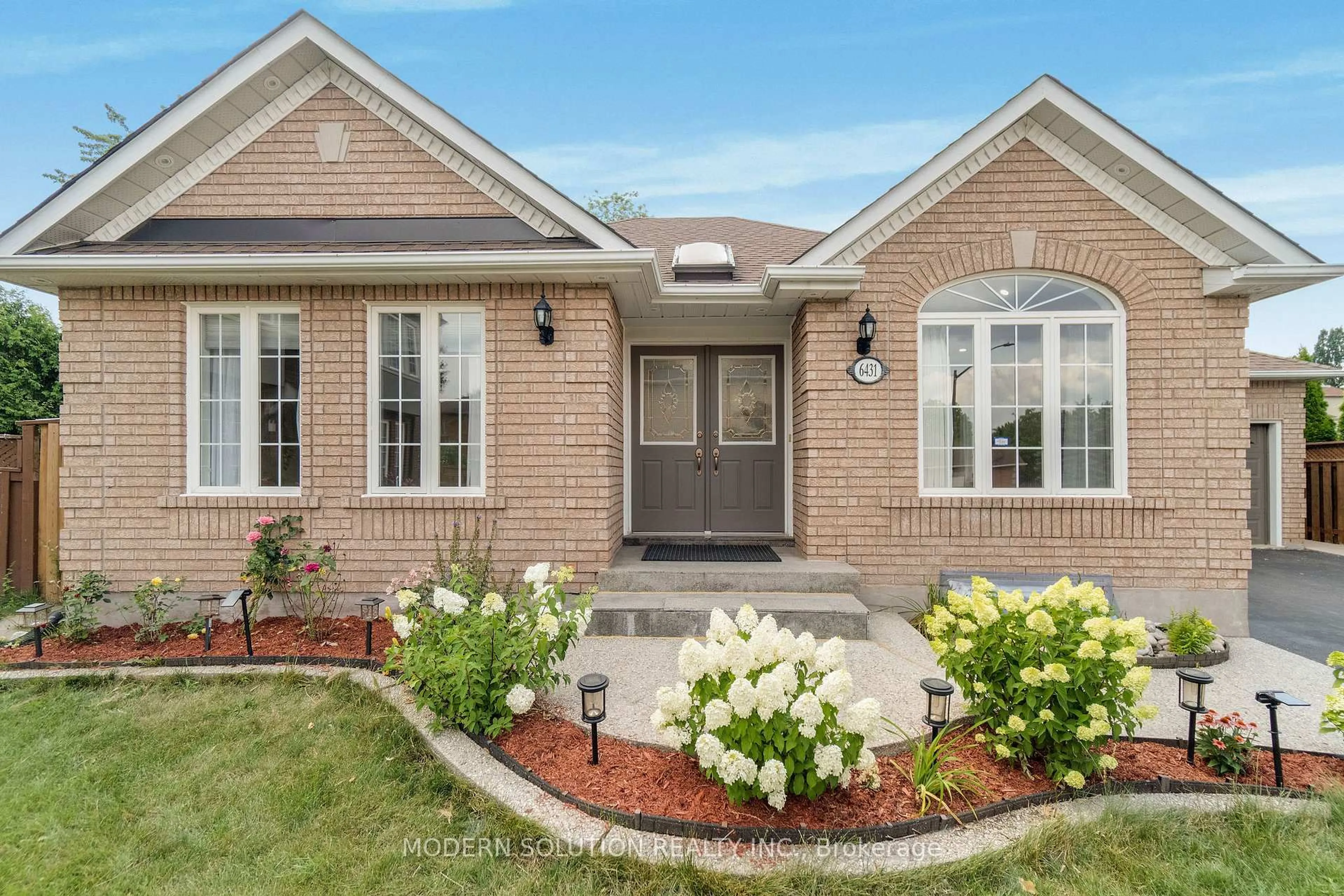 Home with brick exterior material, street for 6431 Tenth Line, Mississauga Ontario L5N 7J5