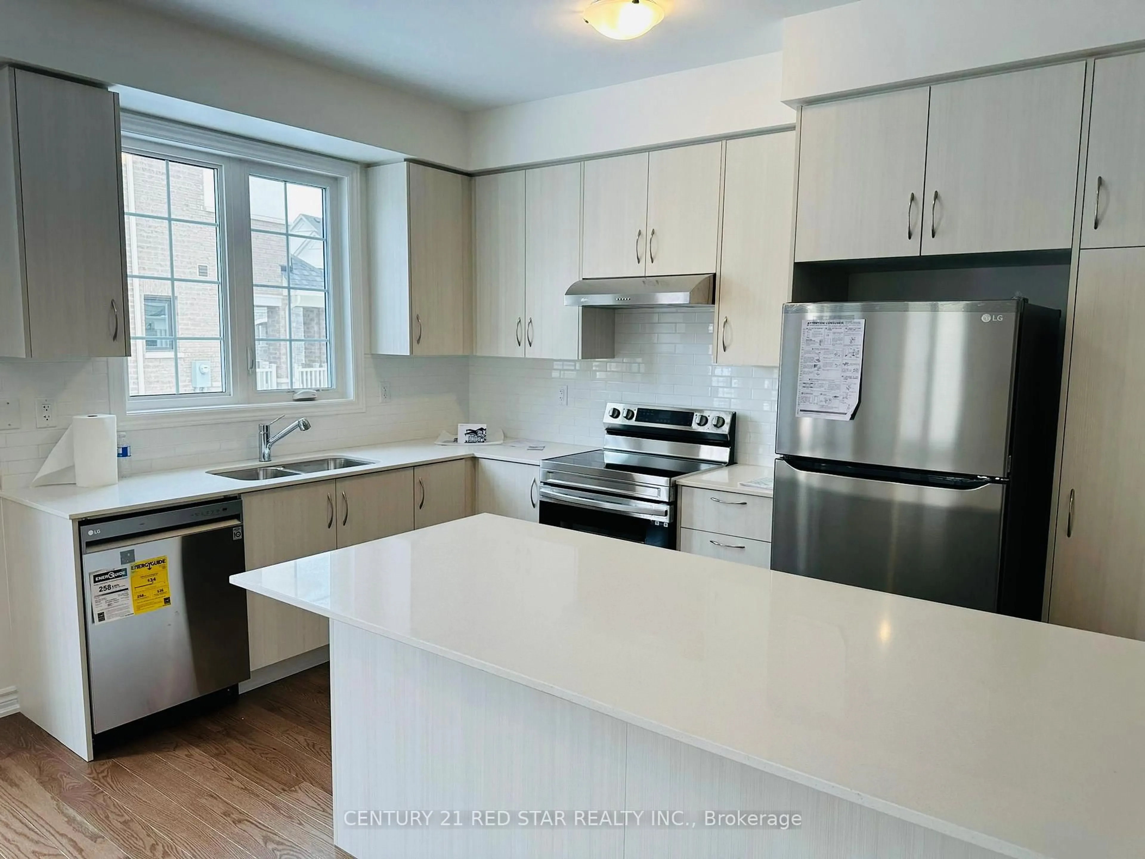 Open concept kitchen, unknown for 441 Bergamot Ave, Milton Ontario L9E 1T9