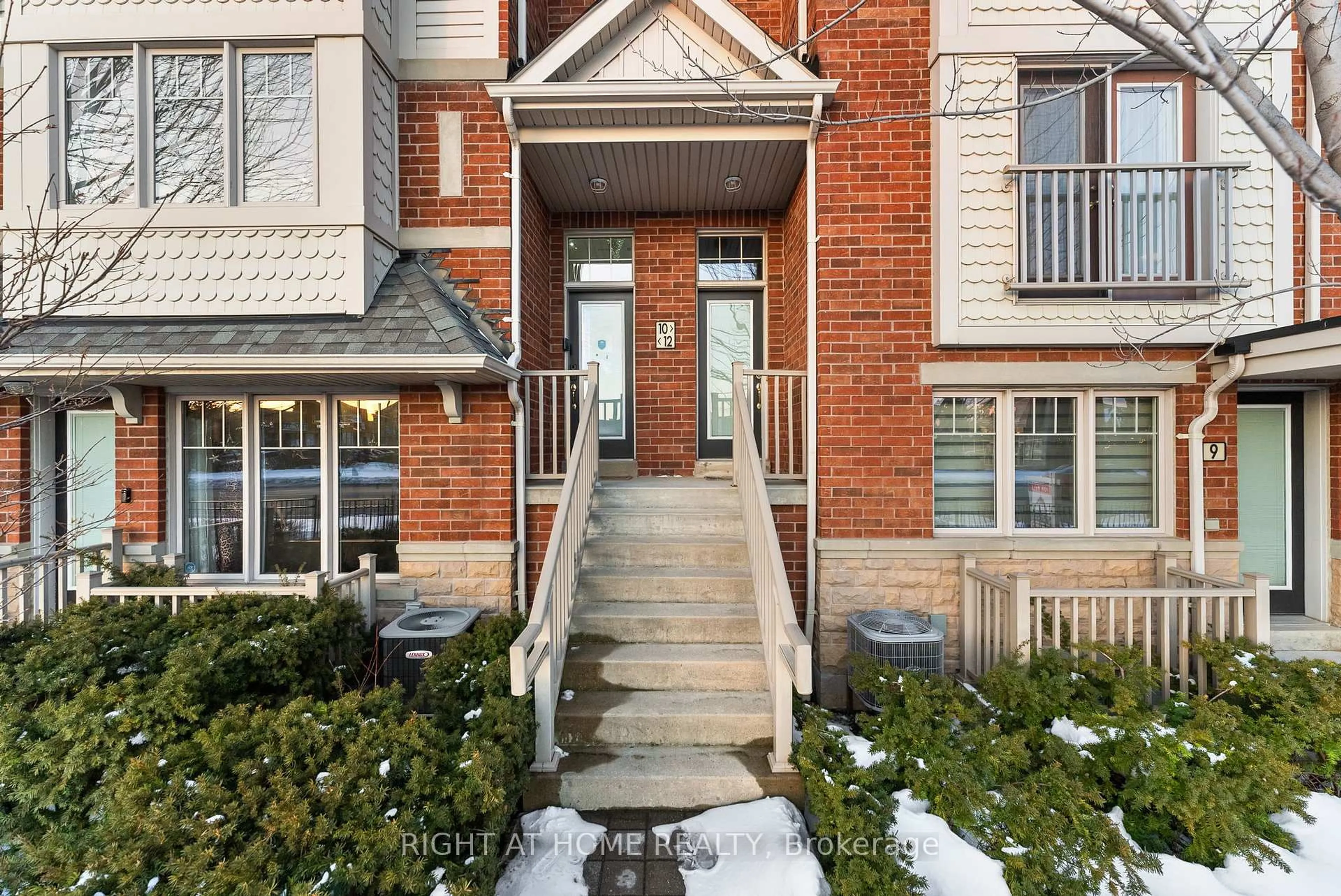 Home with brick exterior material, street for 5725 Tenth Line #12, Mississauga Ontario L5M 0P7