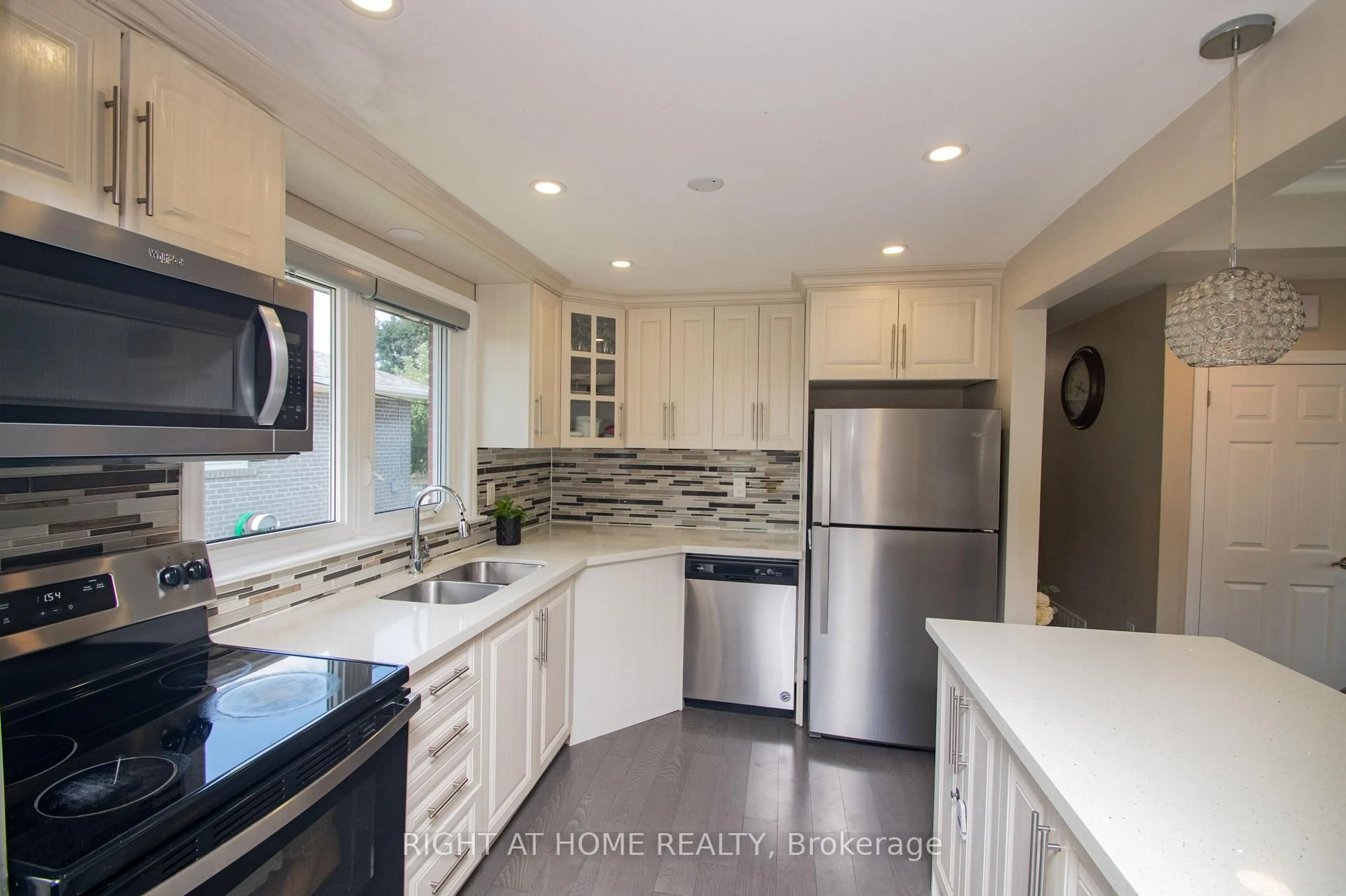 Open concept kitchen, ceramic/tile floor for 65 Bridgenorth Cres, Toronto Ontario M9V 2M5