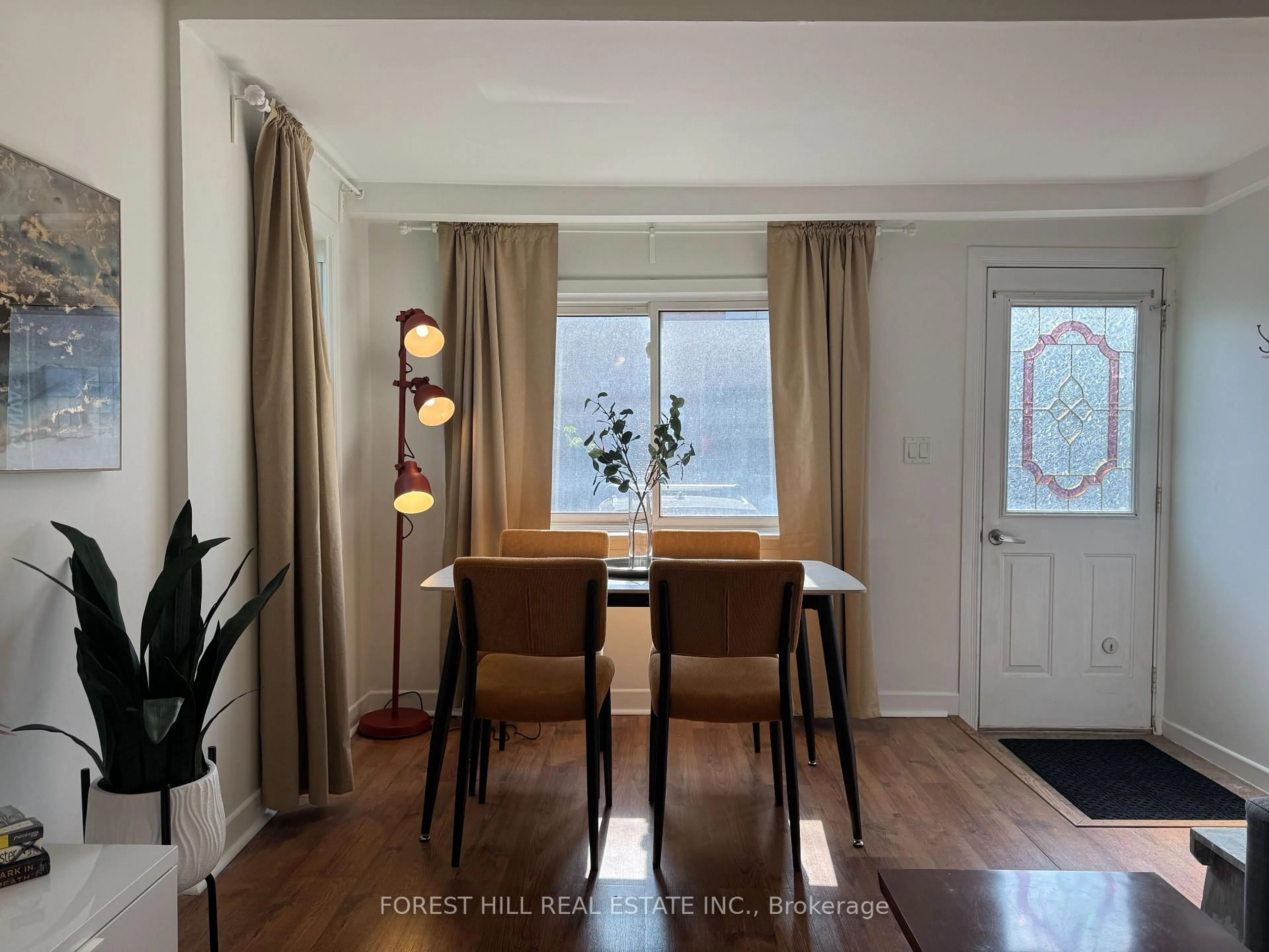 Dining room, wood/laminate floor for 325 Westmoreland Ave, Toronto Ontario M6H 3A6