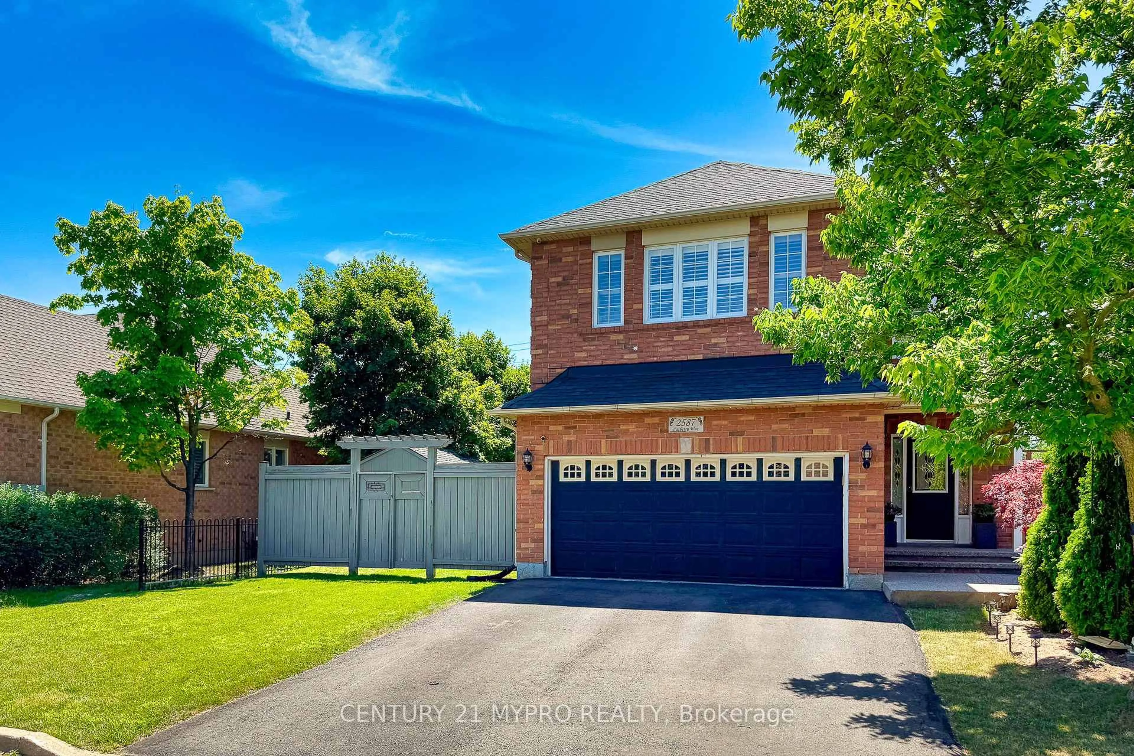 Home with brick exterior material, street for 2587 Carberry Way, Oakville Ontario L6M 4R8