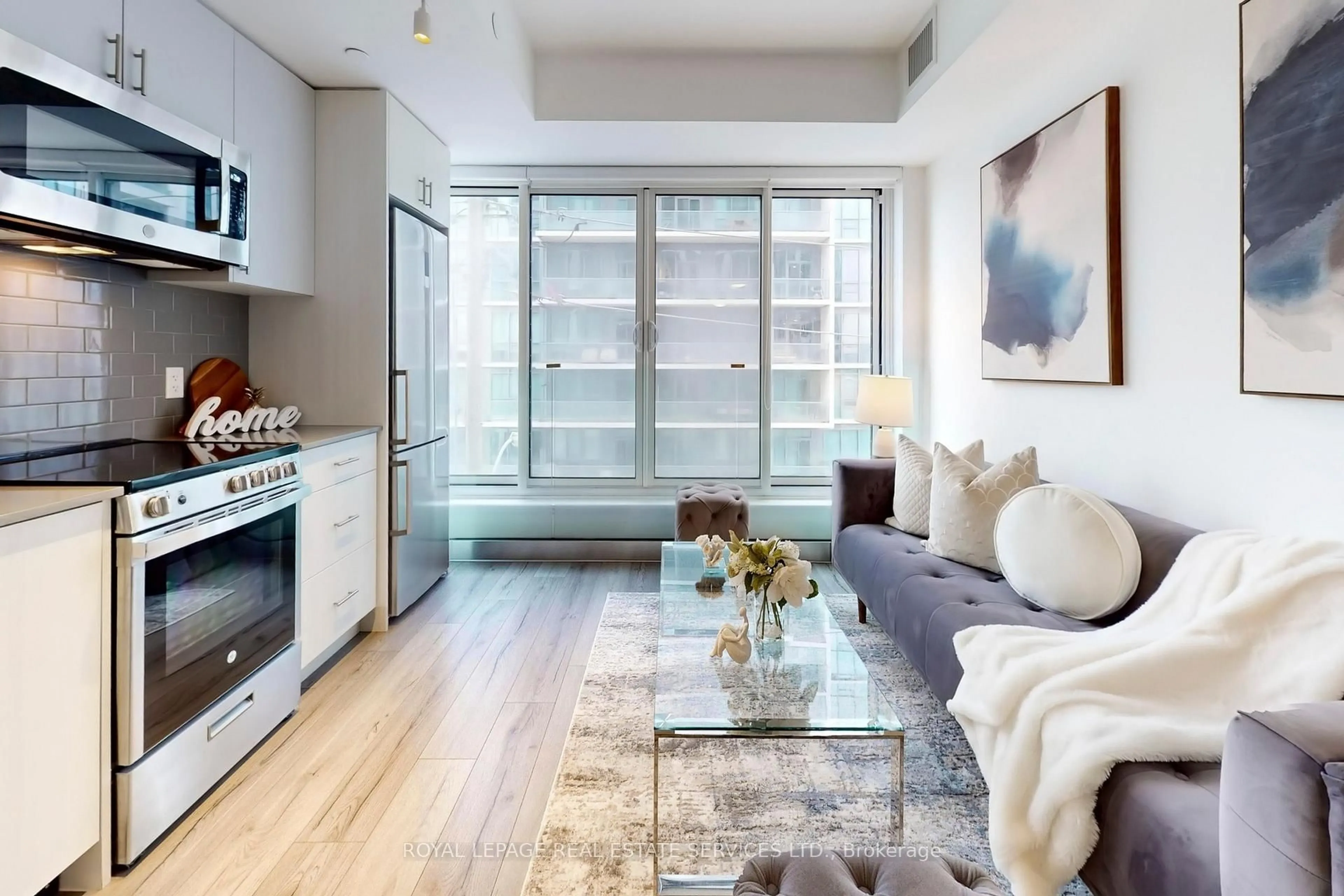 Living room with furniture, unknown for 1195 The Queensway #310, Toronto Ontario M8Z 0H1