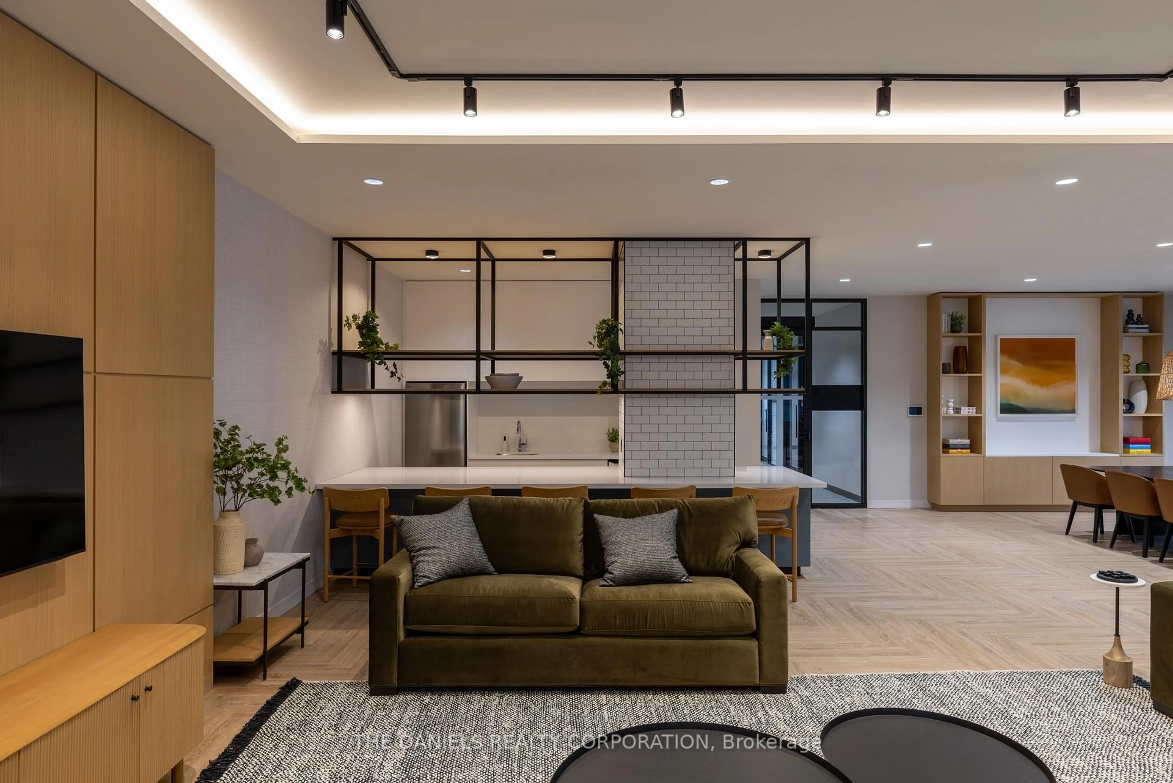 Living room with furniture, cement floor for 2495 Eglinton Ave #907, Mississauga Ontario L5M 2T2