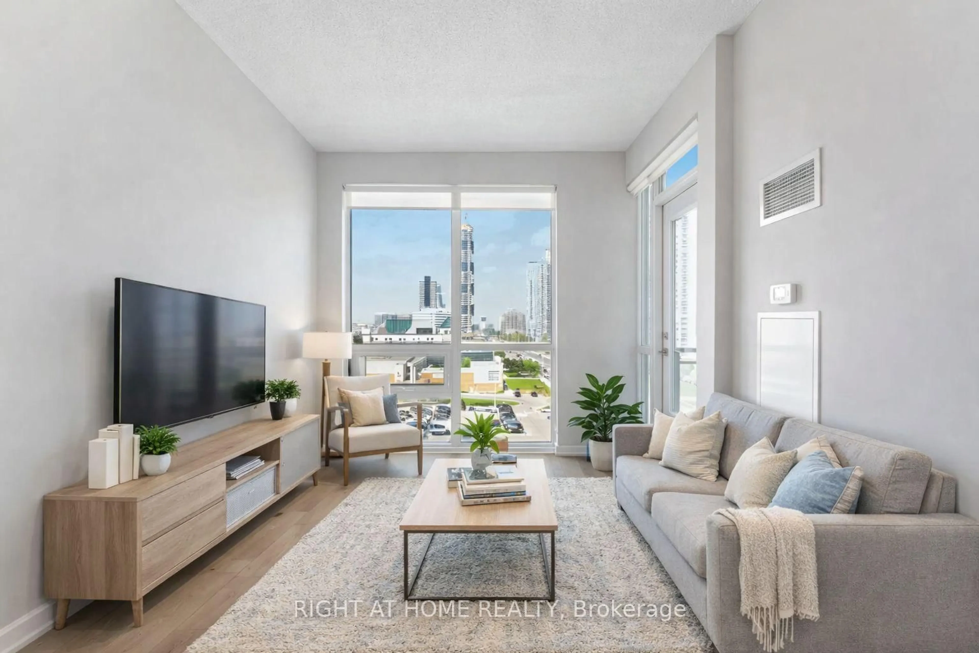 Living room with furniture, unknown for 4011 Brickstone Mews #715, Mississauga Ontario L5B 0J7