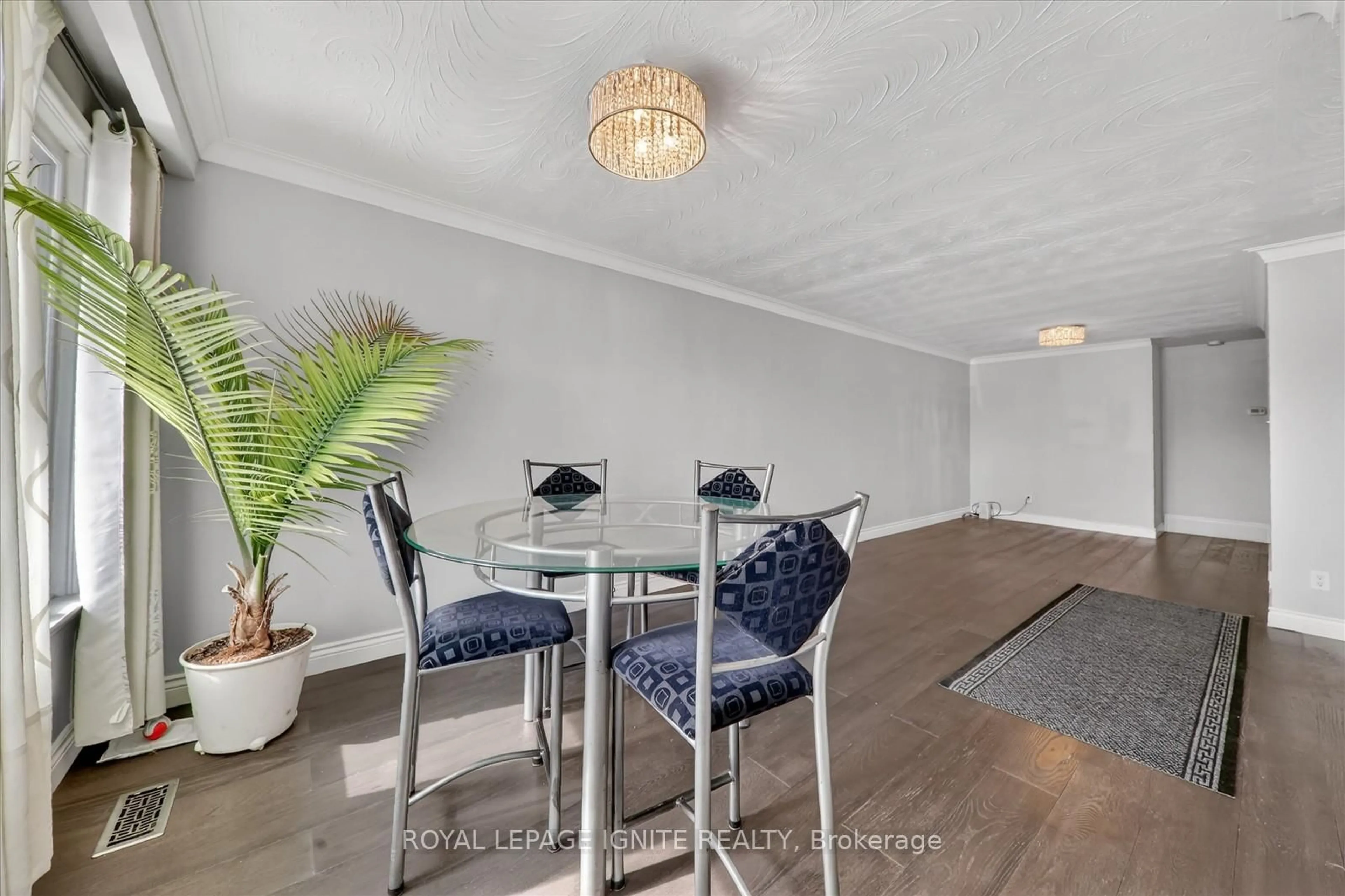 Dining room, wood/laminate floor for 12 Kanarick Cres, Toronto Ontario M3L 1P4