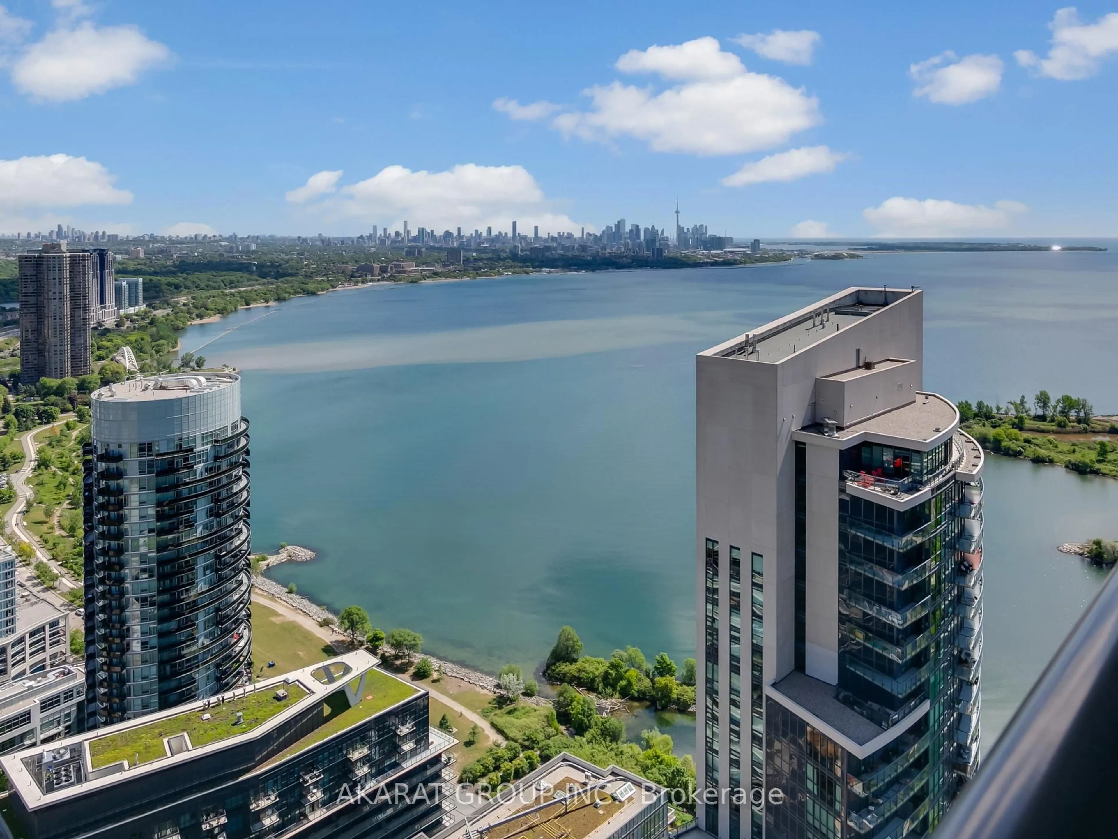 A pic from outside/outdoor area/front of a property/back of a property/a pic from drone, water/lake/river/ocean view for 70 Annie Craig Dr #4603, Toronto Ontario M8V 0G2