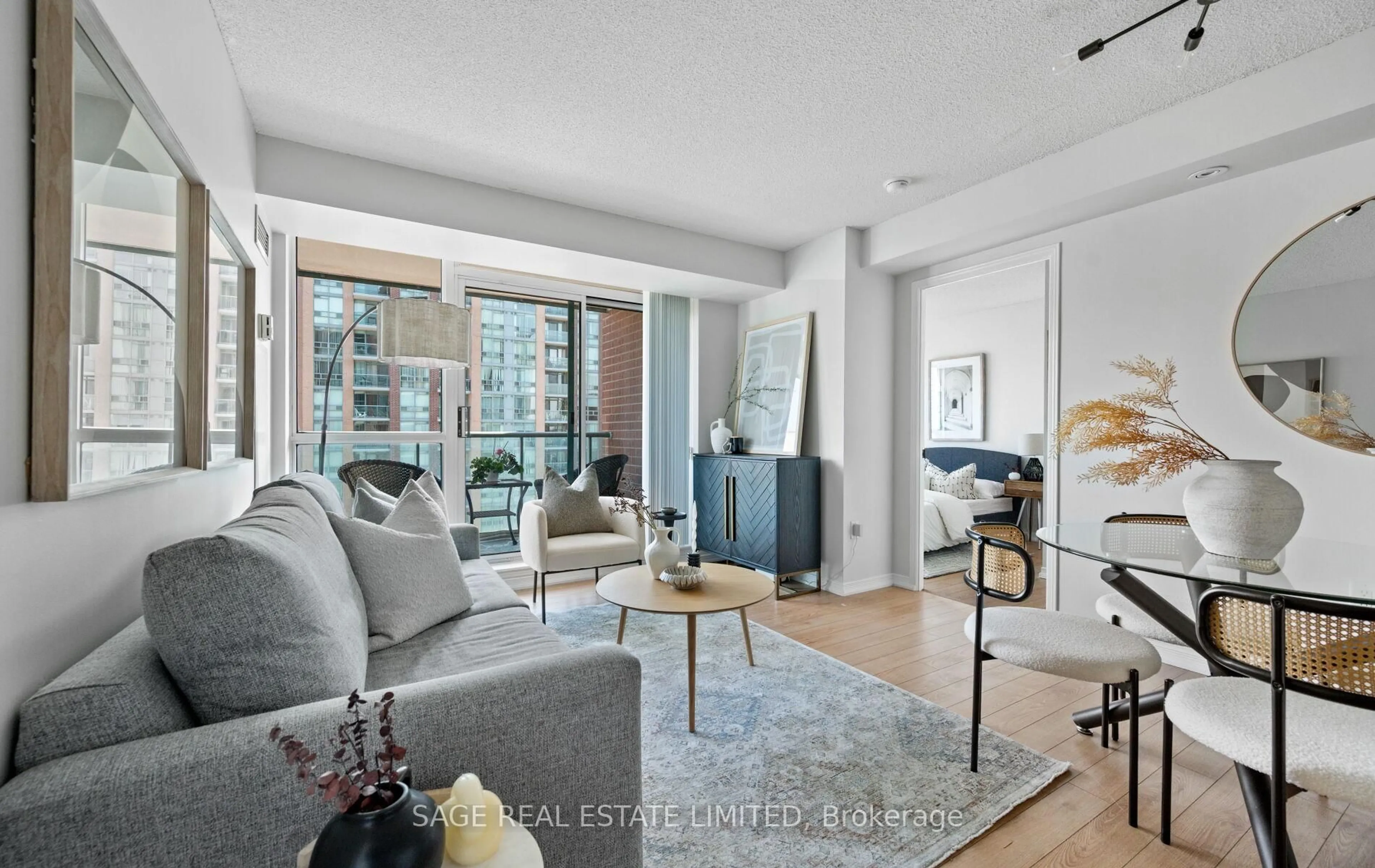 Living room with furniture, unknown for 15 Michael Power Pl #1008, Toronto Ontario M9A 5G4