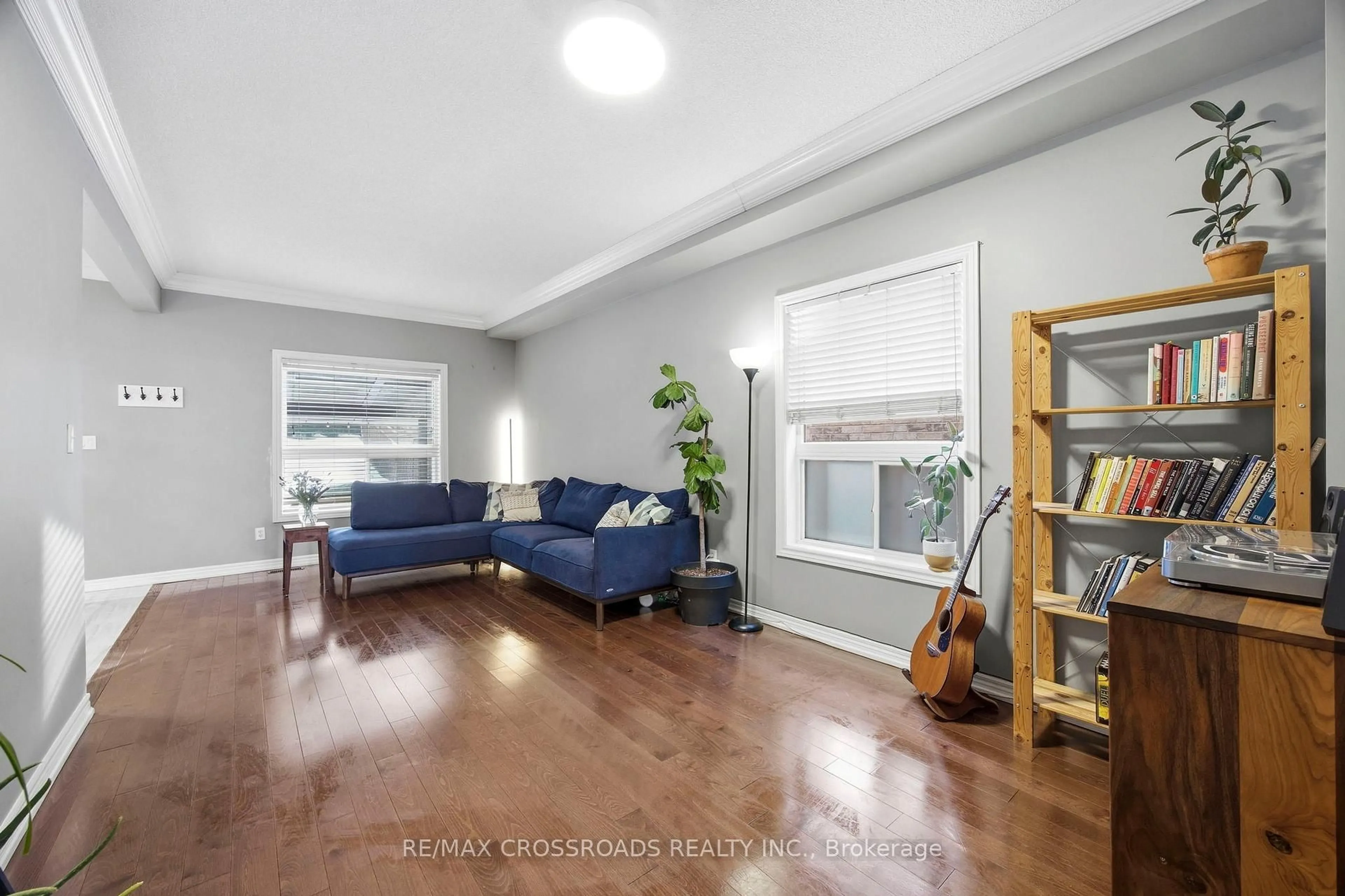 Living room with furniture, wood/laminate floor for 12 Sam Frustaglio Dr, Toronto Ontario M9N 3Y5