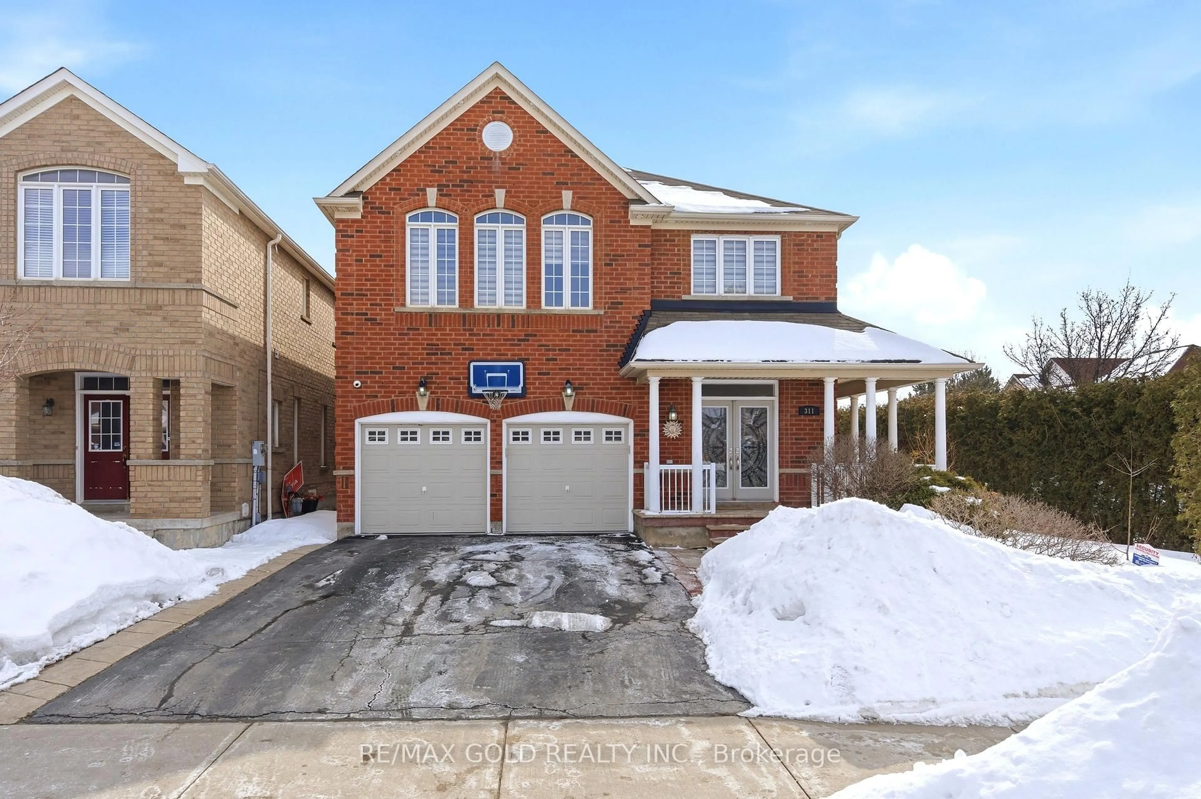 Home with brick exterior material, street for 311 Father Tobin Rd, Brampton Ontario L6R 0P4