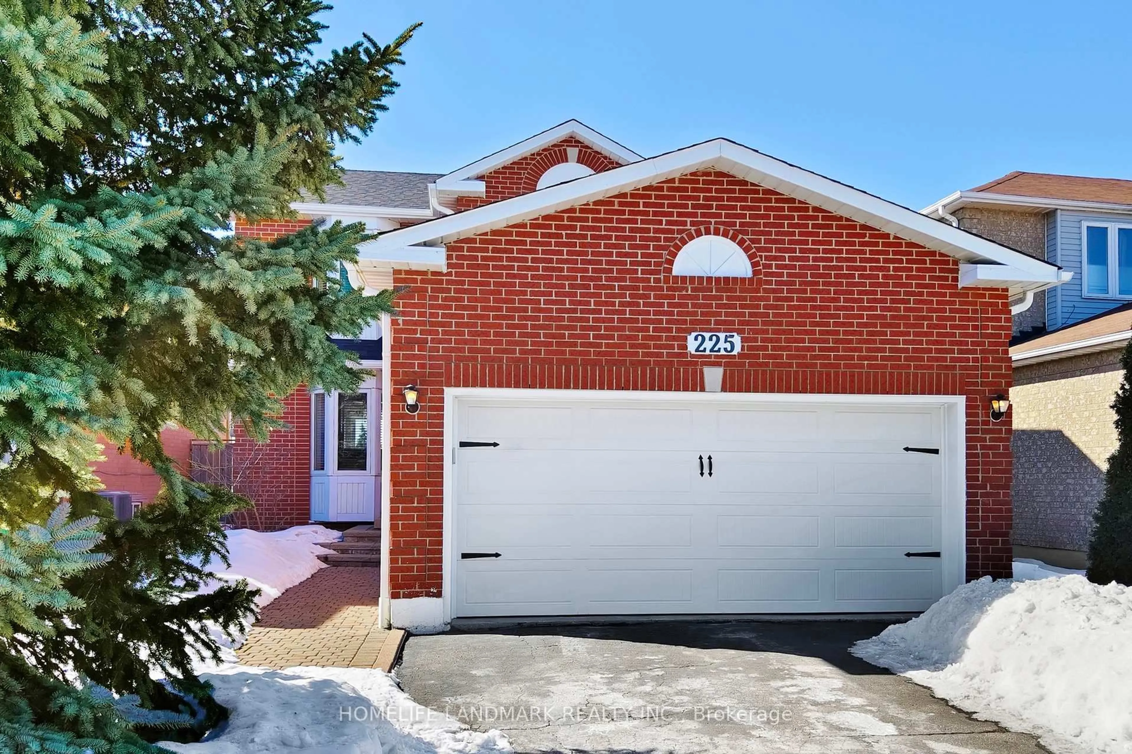 Home with brick exterior material, street for 225 Wildwood Tr, Mississauga Ontario L4Z 3S4