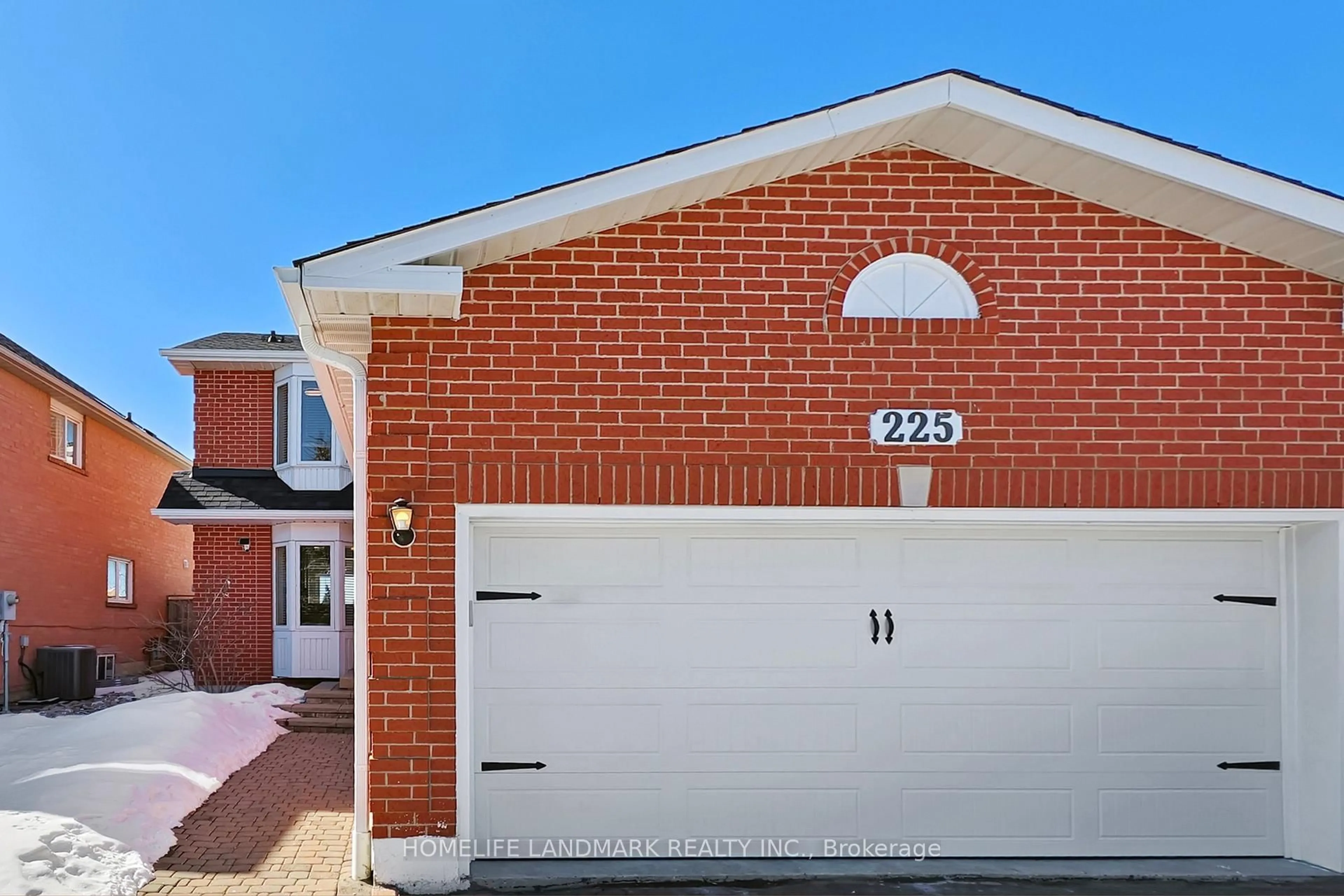 Home with brick exterior material, street for 225 Wildwood Tr, Mississauga Ontario L4Z 3S4
