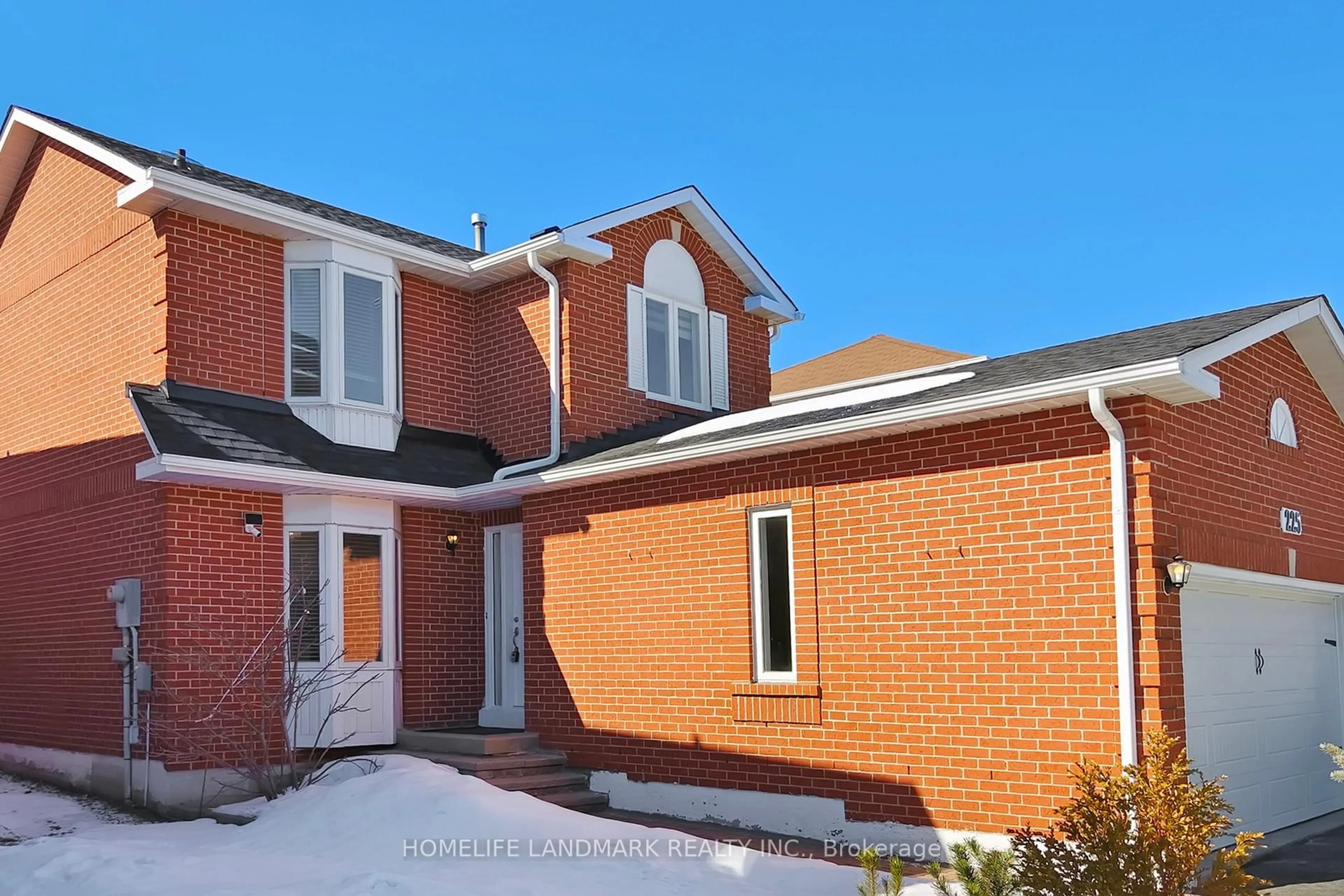 Home with brick exterior material, street for 225 Wildwood Tr, Mississauga Ontario L4Z 3S4