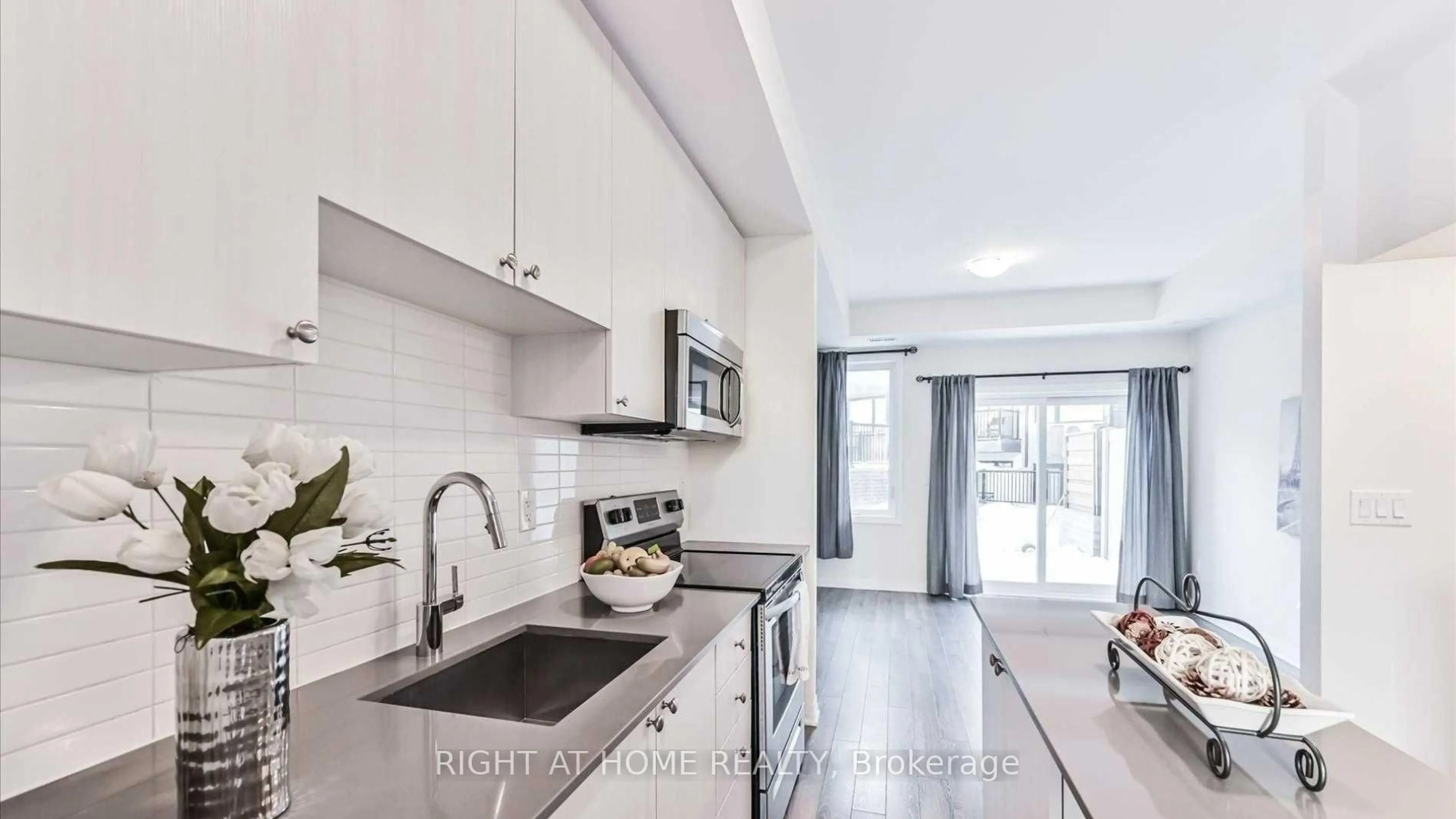 Open concept kitchen, ceramic/tile floor for 19 Thomas Mulholland Dr, Toronto Ontario M3K 0B5
