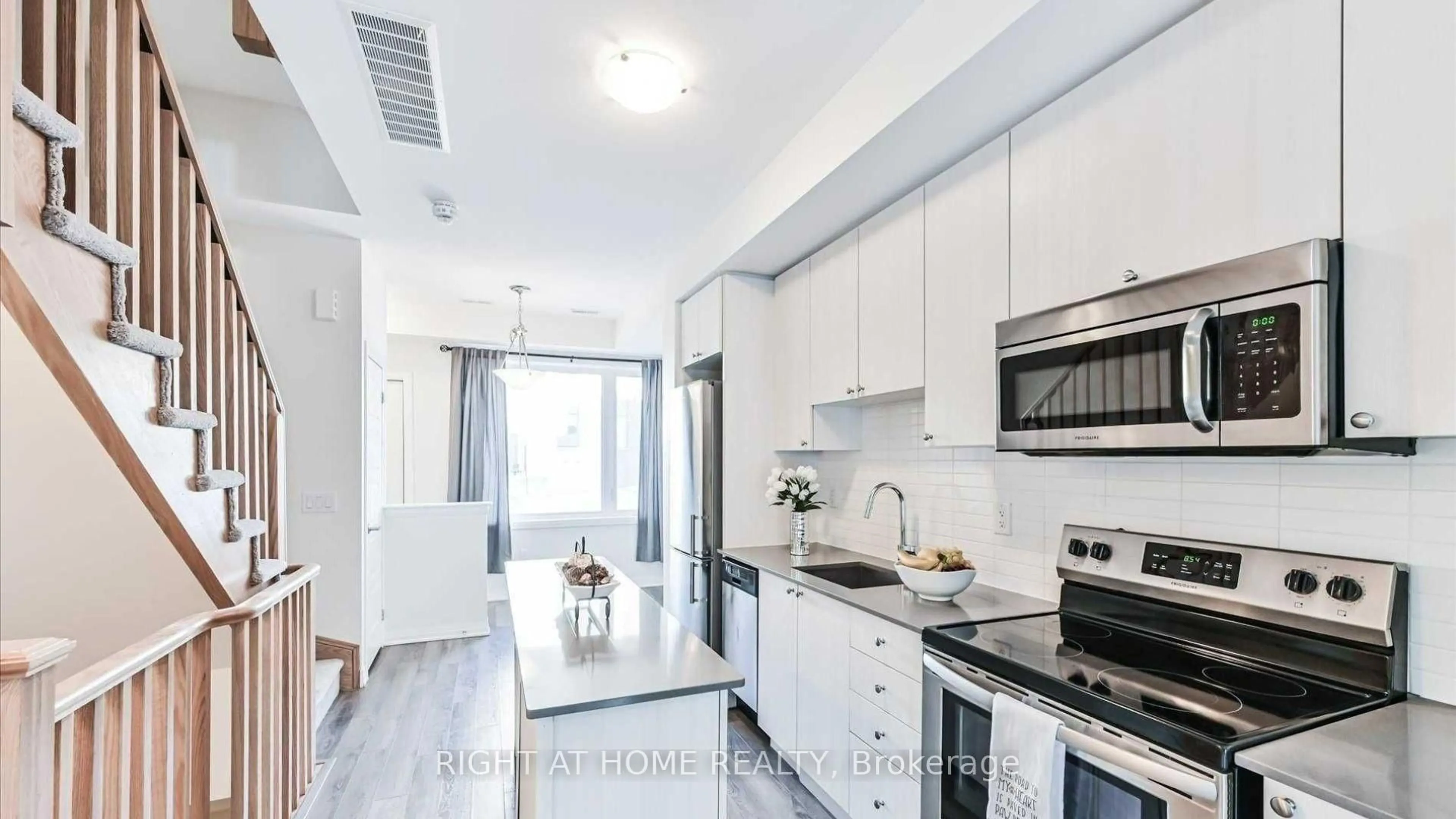 Open concept kitchen, ceramic/tile floor for 19 Thomas Mulholland Dr, Toronto Ontario M3K 0B5