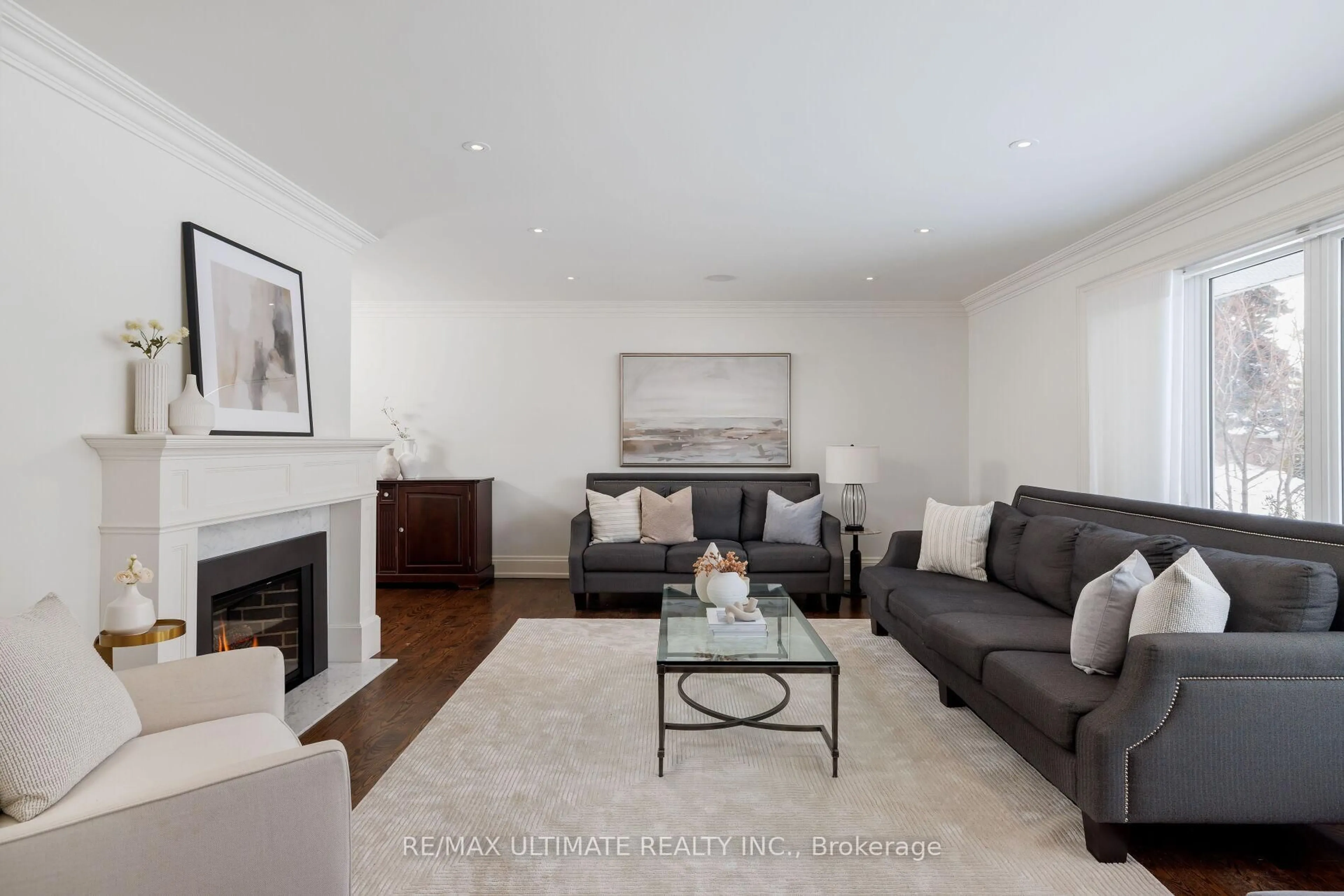 Living room with furniture, wood/laminate floor for 27 Ravensbourne Cres, Toronto Ontario M9A 2A9