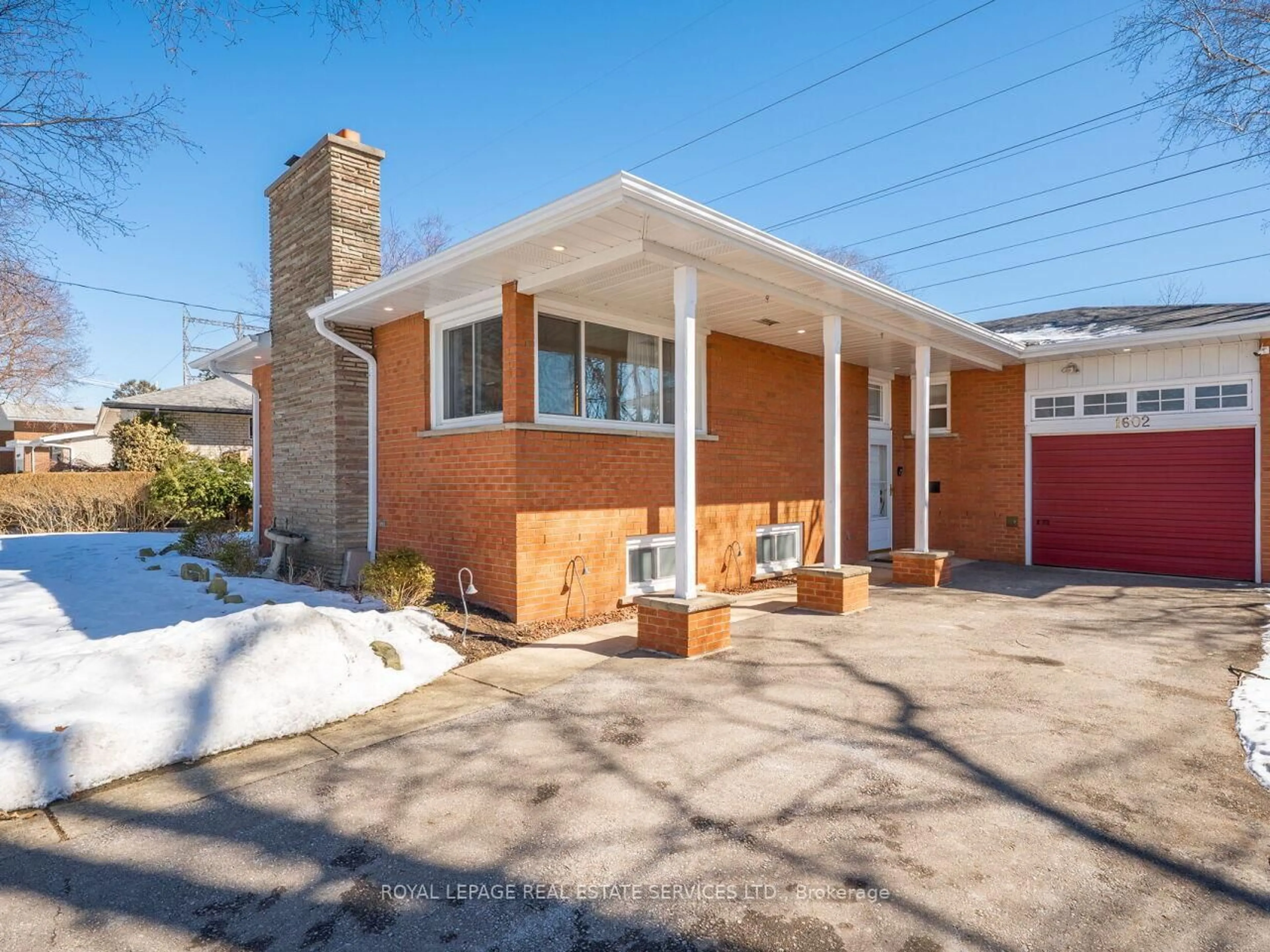 Home with brick exterior material, street for 1602 Carletta Dr, Mississauga Ontario L4X 1E5
