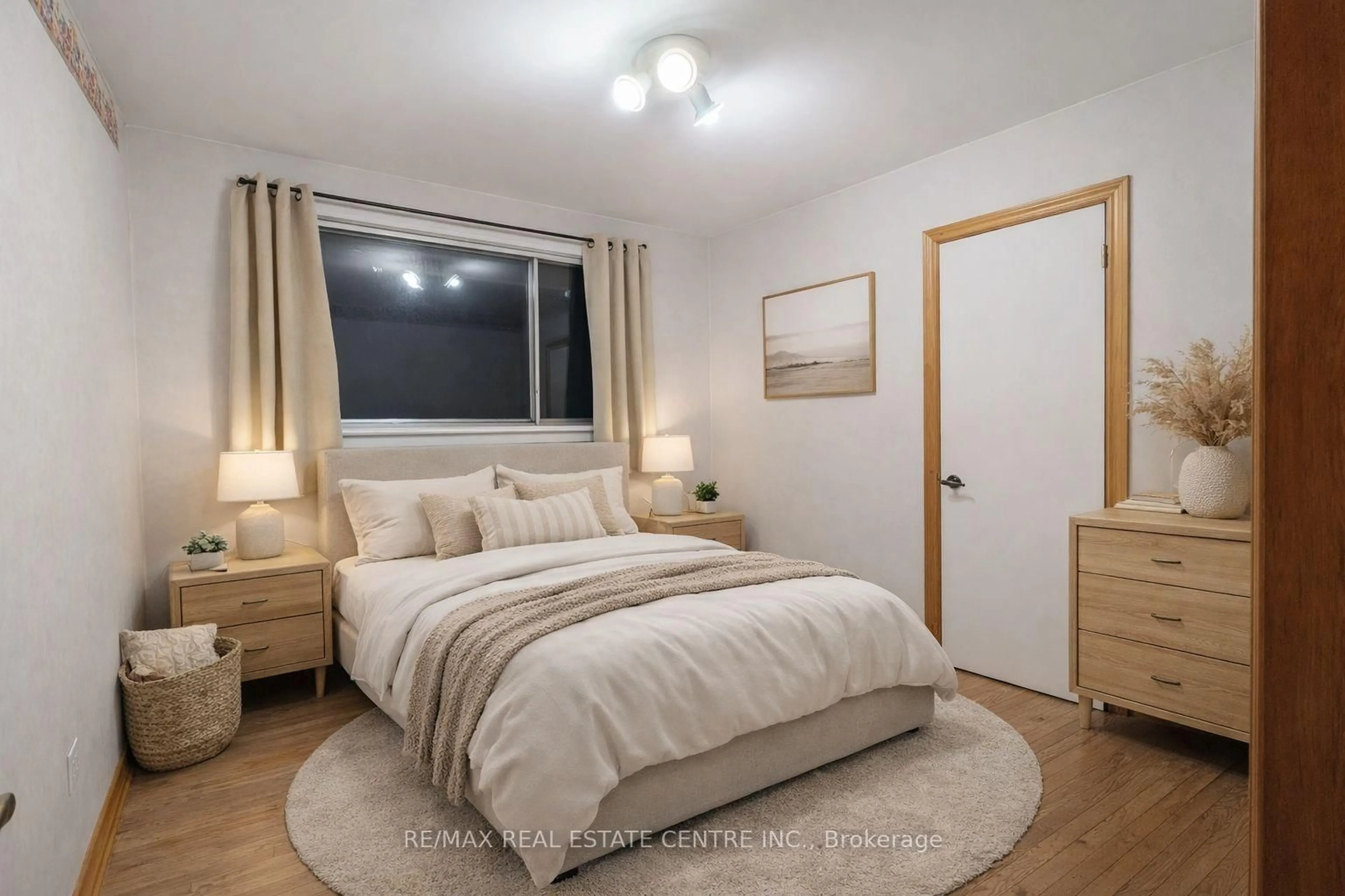 Bedroom with bed, wood/laminate floor for 593 Indian Rd, Mississauga Ontario L5H 1R1