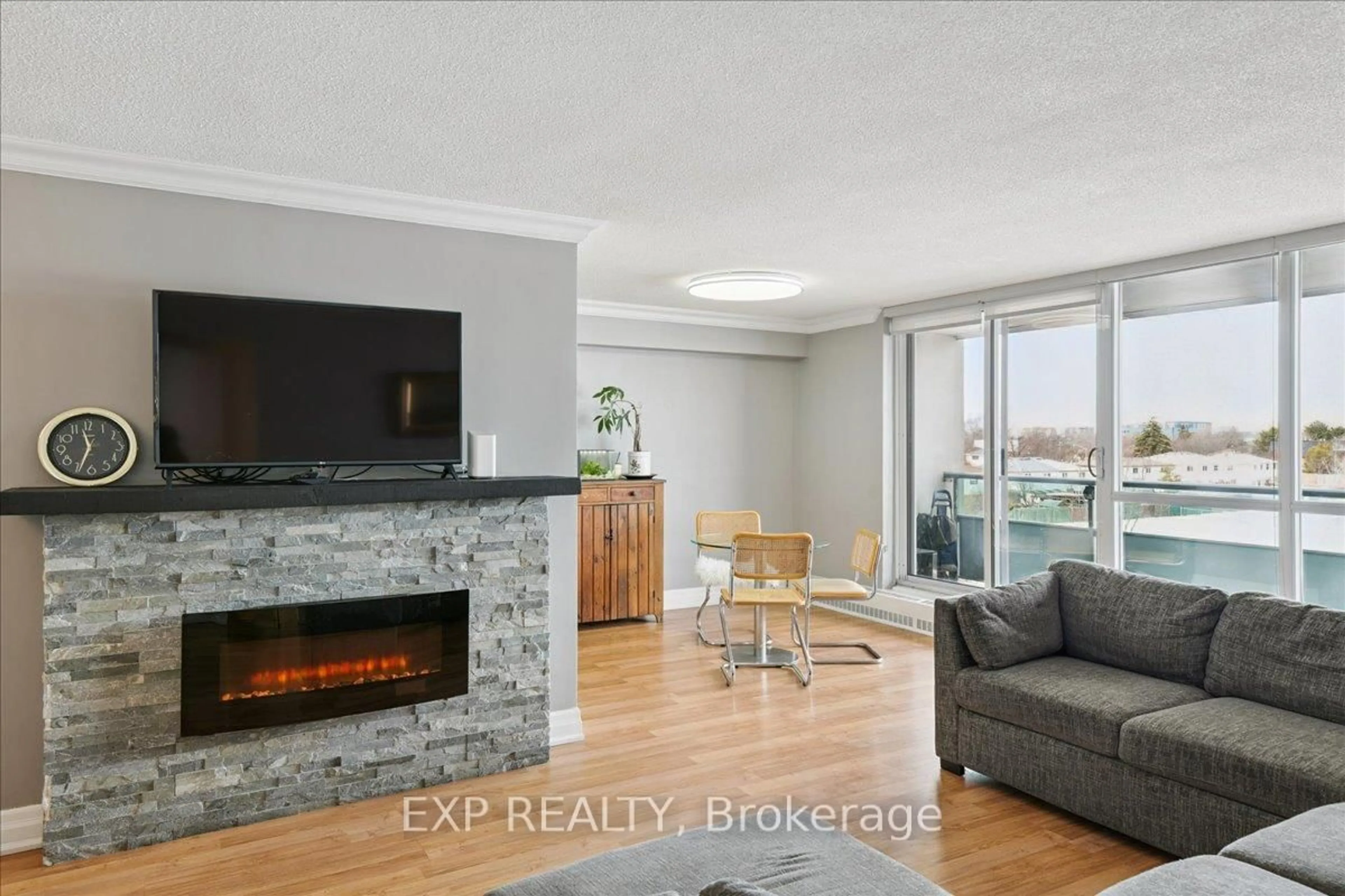 Living room with furniture, unknown for 44 Longbourne Dr #412, Toronto Ontario M9R 2M7
